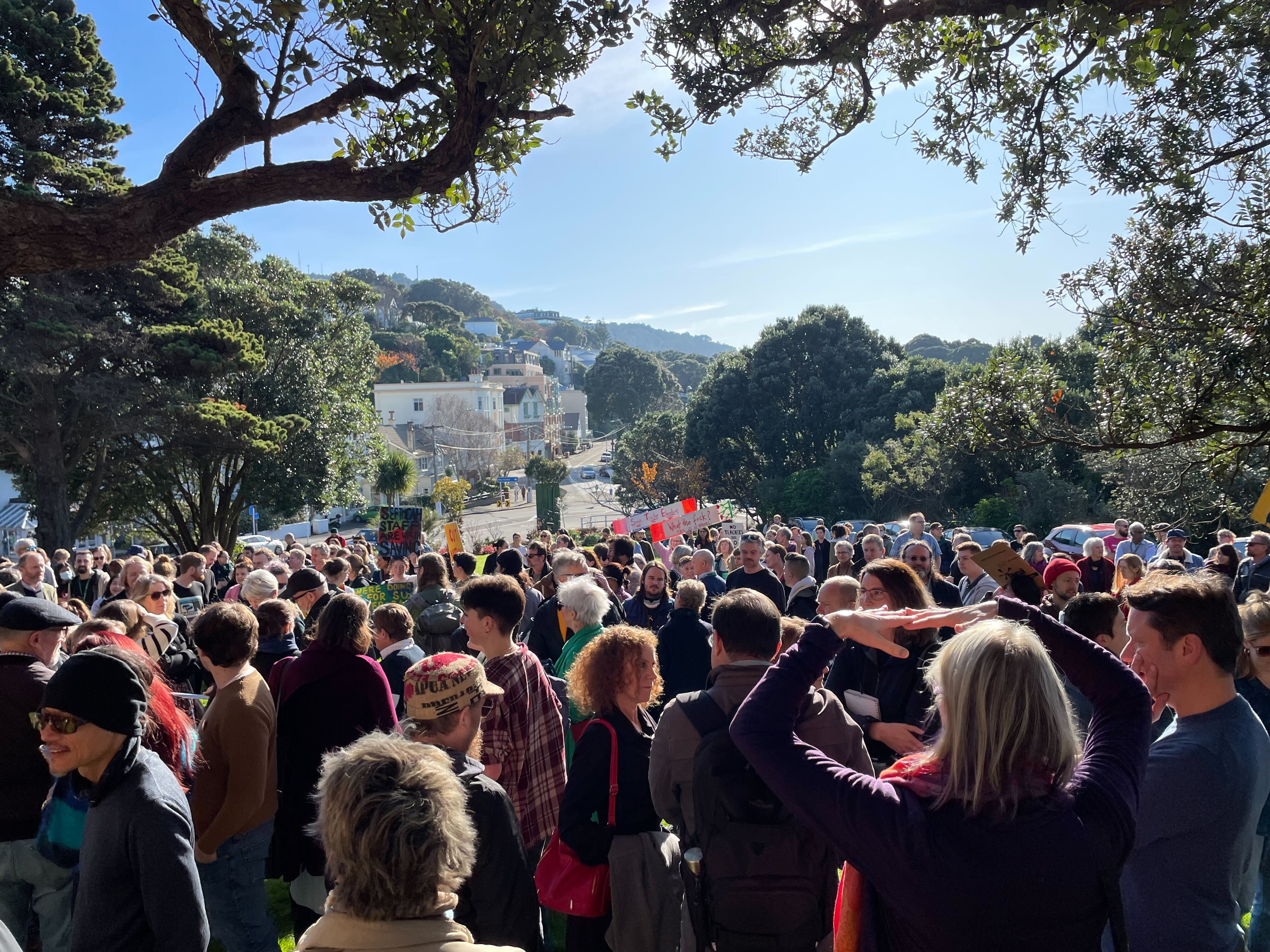 Hundreds of people protest job cuts at Victoria University in June. Photo / Azaria Howell