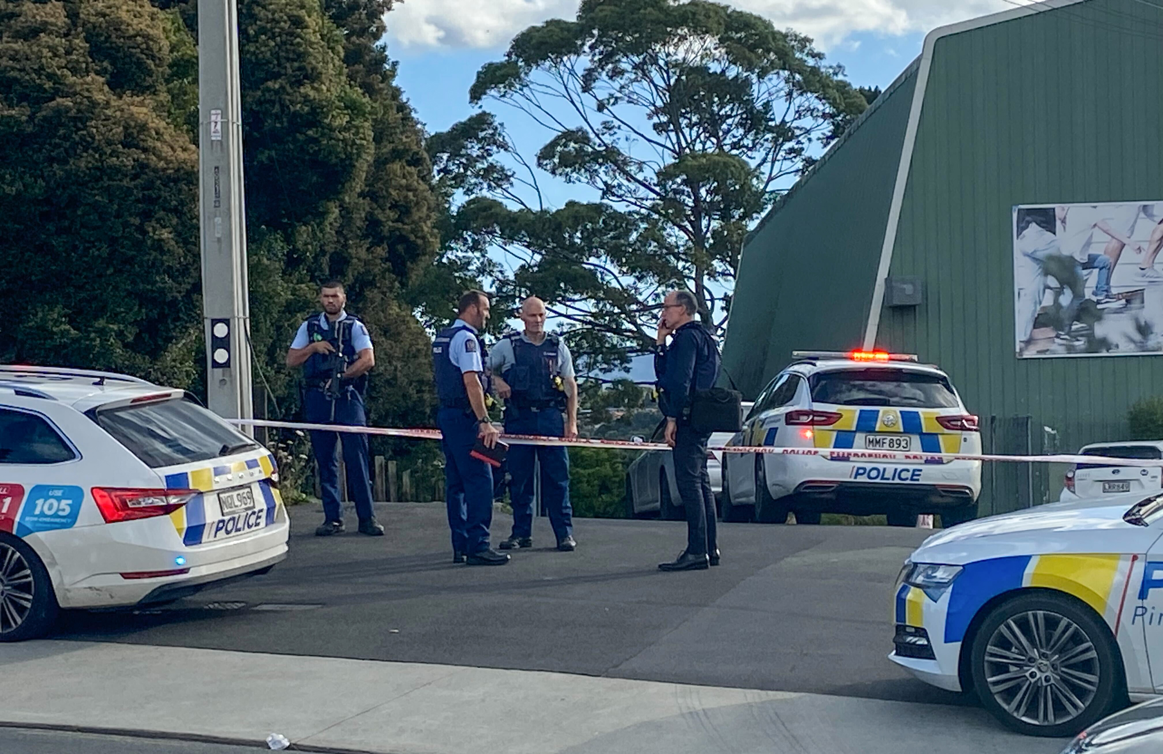 Police on the scene outside the Waitakere Badminton Centre on Royal Rd Massey after a woman was stabbed to death. Photo / Lincoln Tan
