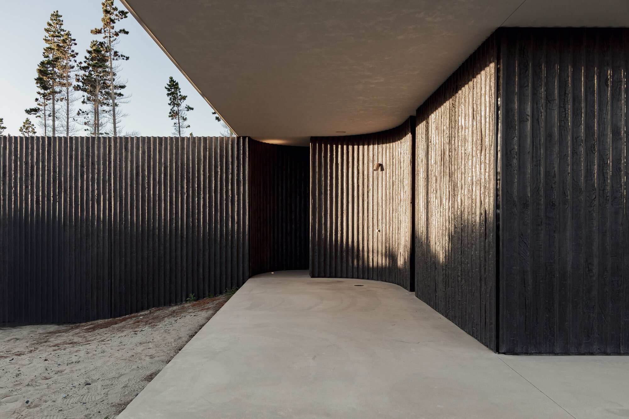 Darker features at the entranceway to Te Arai house. Photo / Monk Mackenzie