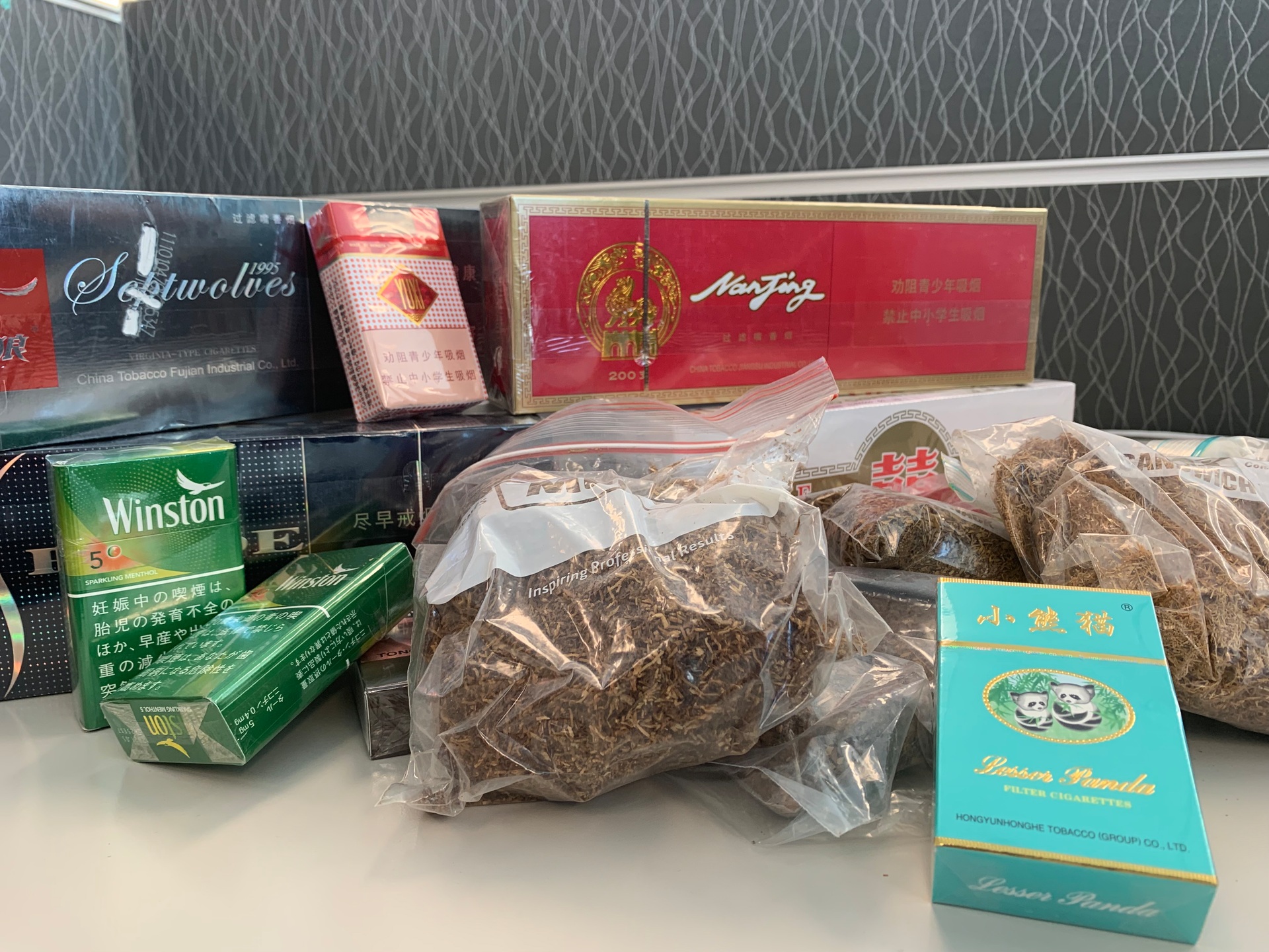 Examples of foreign cigarette packets found in New Zealand and homegrown tobacco. Photo / Imperial Brands Australasia