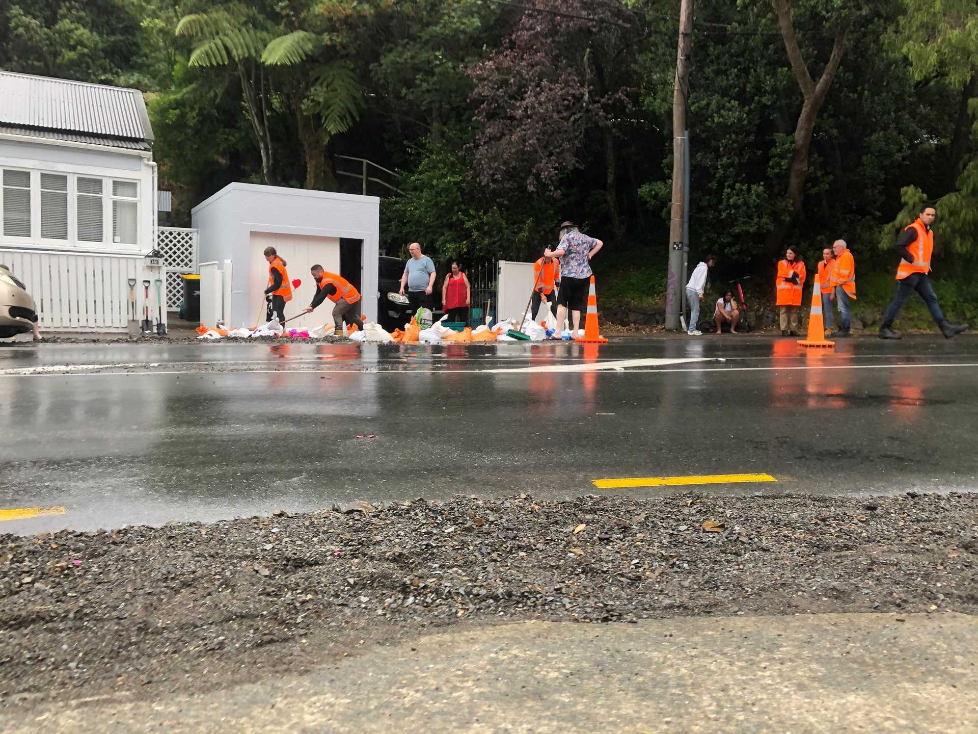 Sand bags have been brought in to protect a home. Photo / Jack Crossland 
