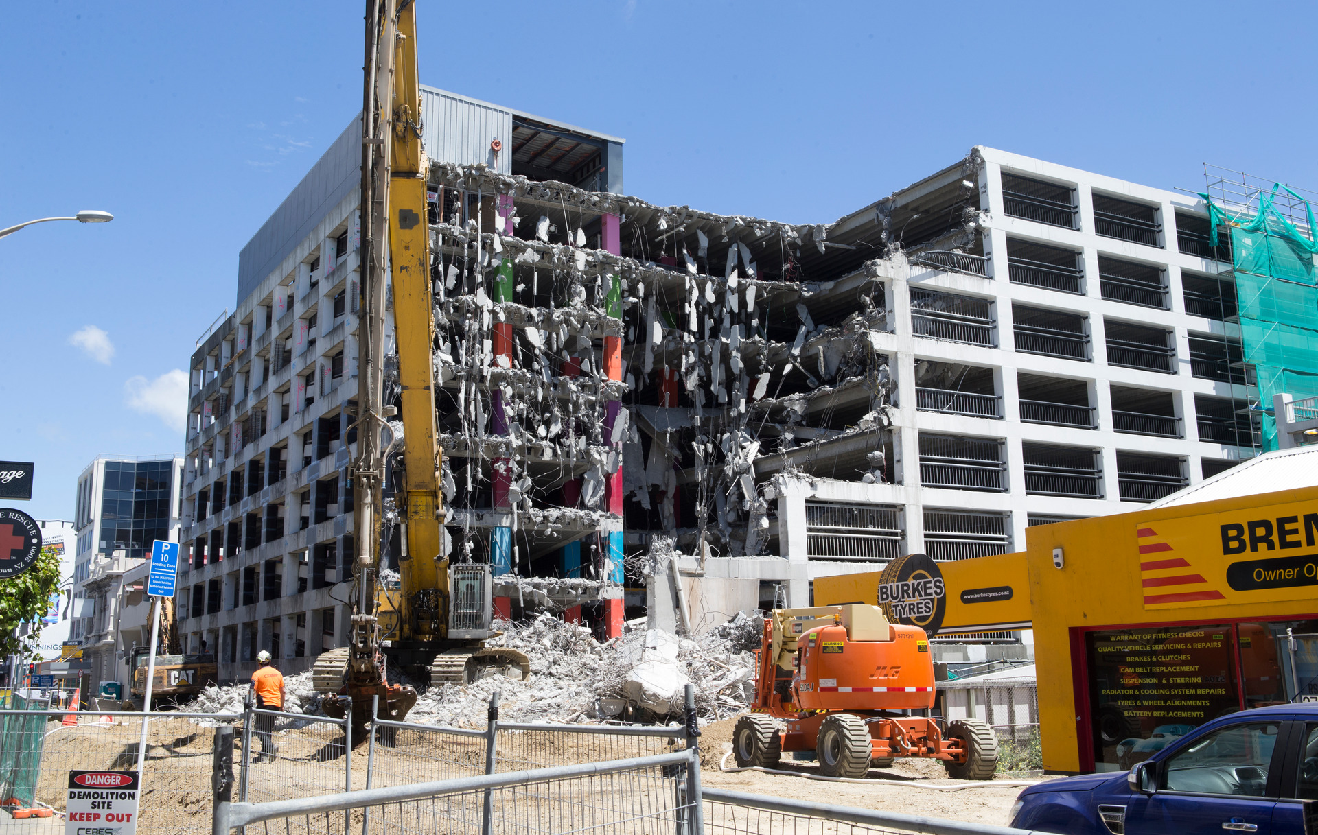 Work underway to demolish the Reading Cinema car park building in Wellington after it was badly damaged in the Kaikoura earthquake. 09 January 2017. New Zealand Herald photograph by Mark Mitchell 