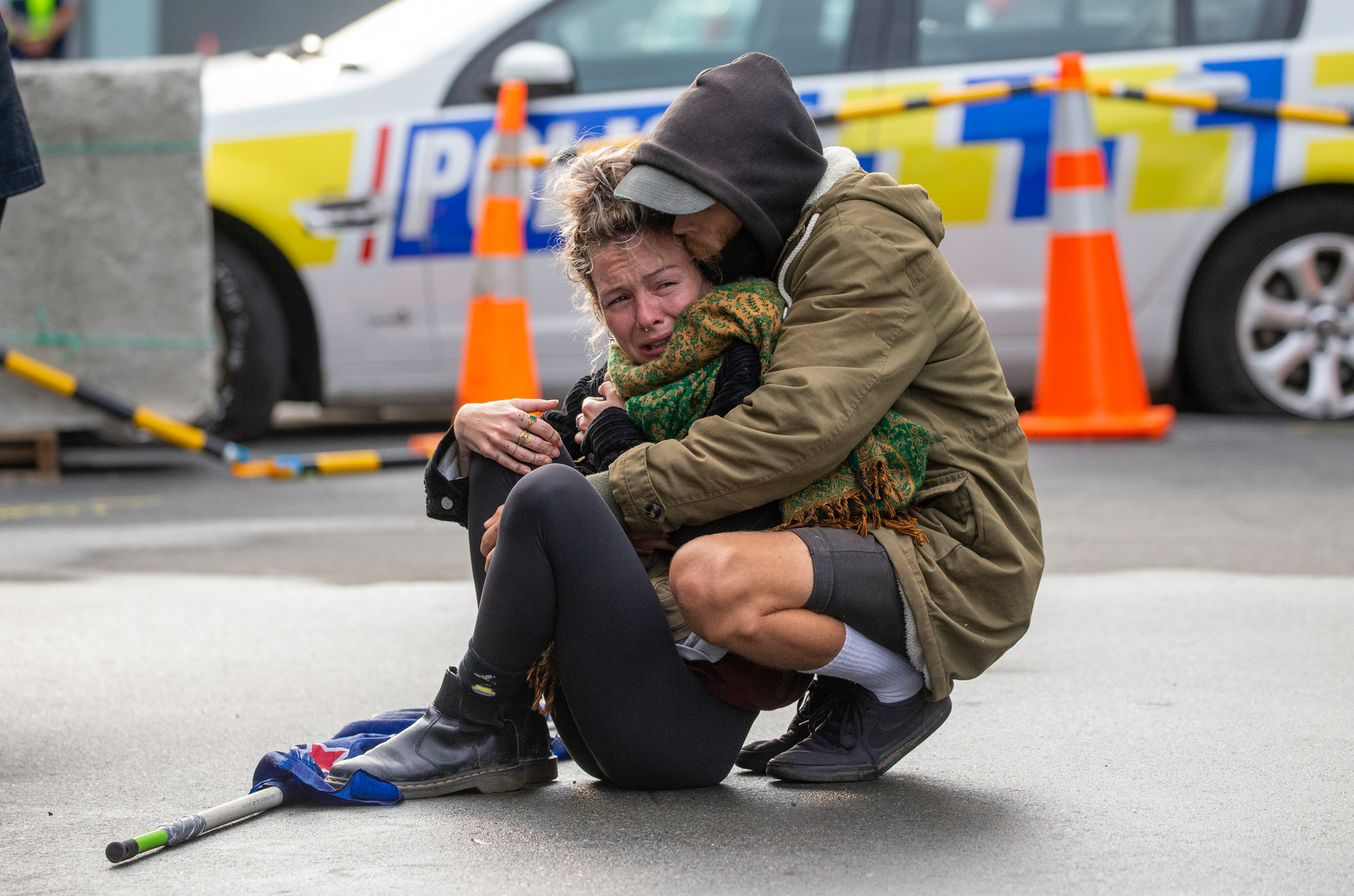 A protester being comforted after police action against them on day 23 of the Covid-19 Convoy protest at Parliament. Photo / Mark Mitchell