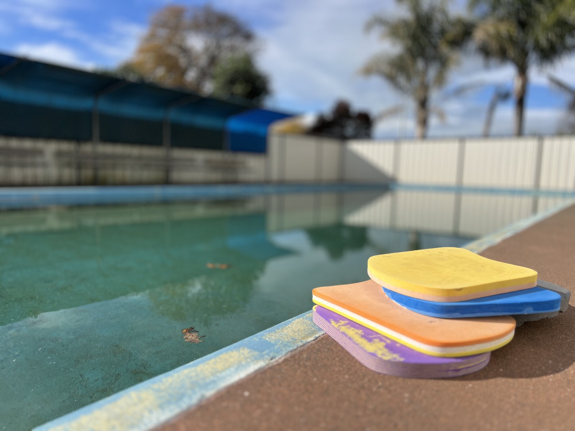 The school pool has only about 10 flutter boards, no lane dividers to safely teach different swimming levels, and no pool cover, leaving staff to spend time clearing debris instead of working with children in classrooms. Photo / Rafaella Melo