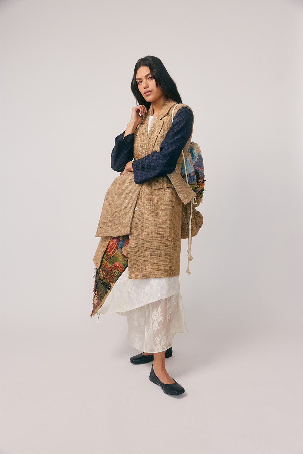 'Fabric Has Memory' by Jacqueline Tsang renews a damaged wedding dress, obsolete coffee sacks and vintage tapestry. Photo / Apela Bell