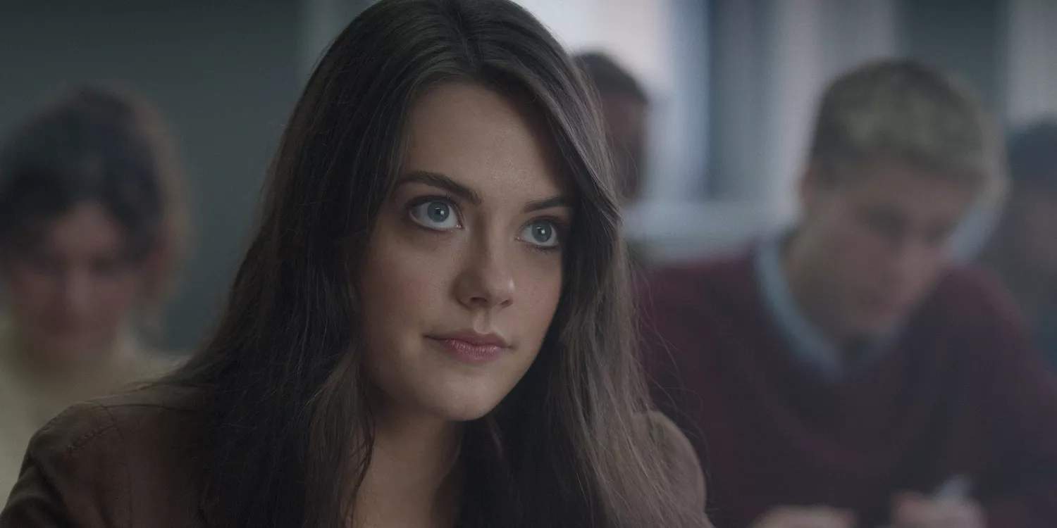In another still from the show, Kate appears to be in class, while Prince William can be seen sitting in the row behind her, out of focus of the camera. Photo / Netflix