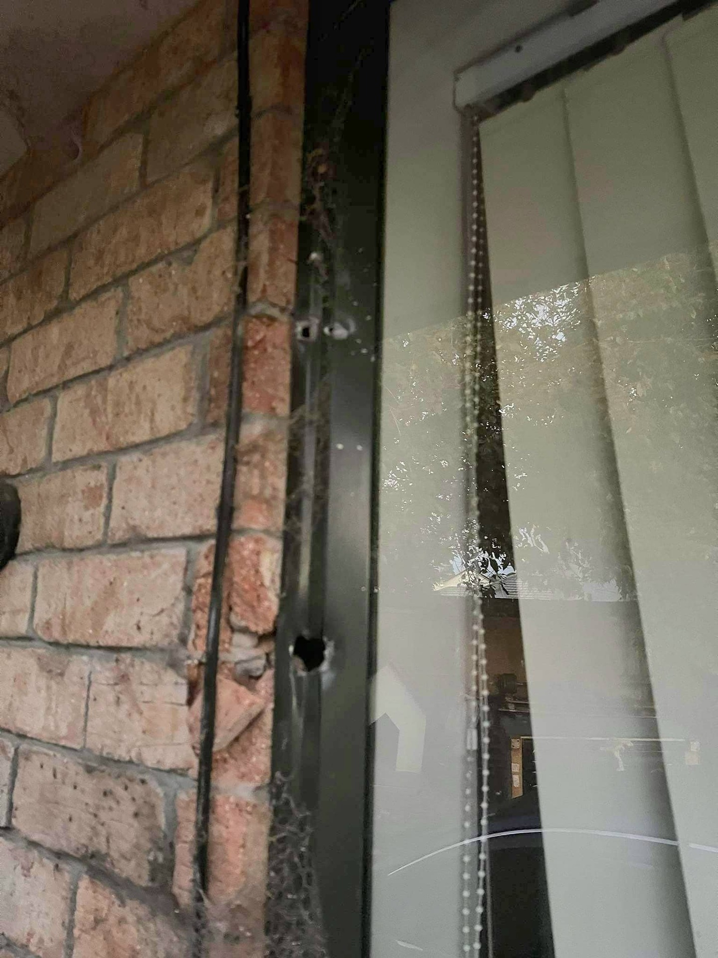 Some bullets lodged themselves in the bricks lining the house and fortunately didn't make it through to the bedroom. Photo / Supplied