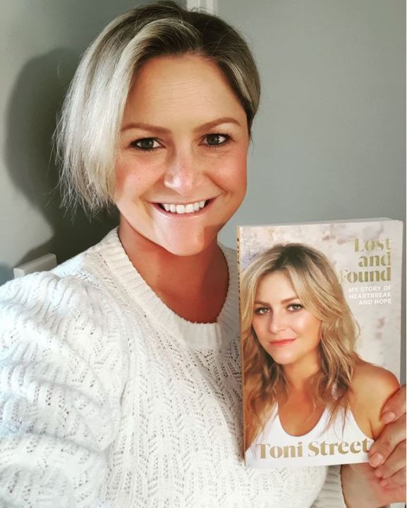 Toni wth her book, which is available from Tuesday. Photo / Instagram