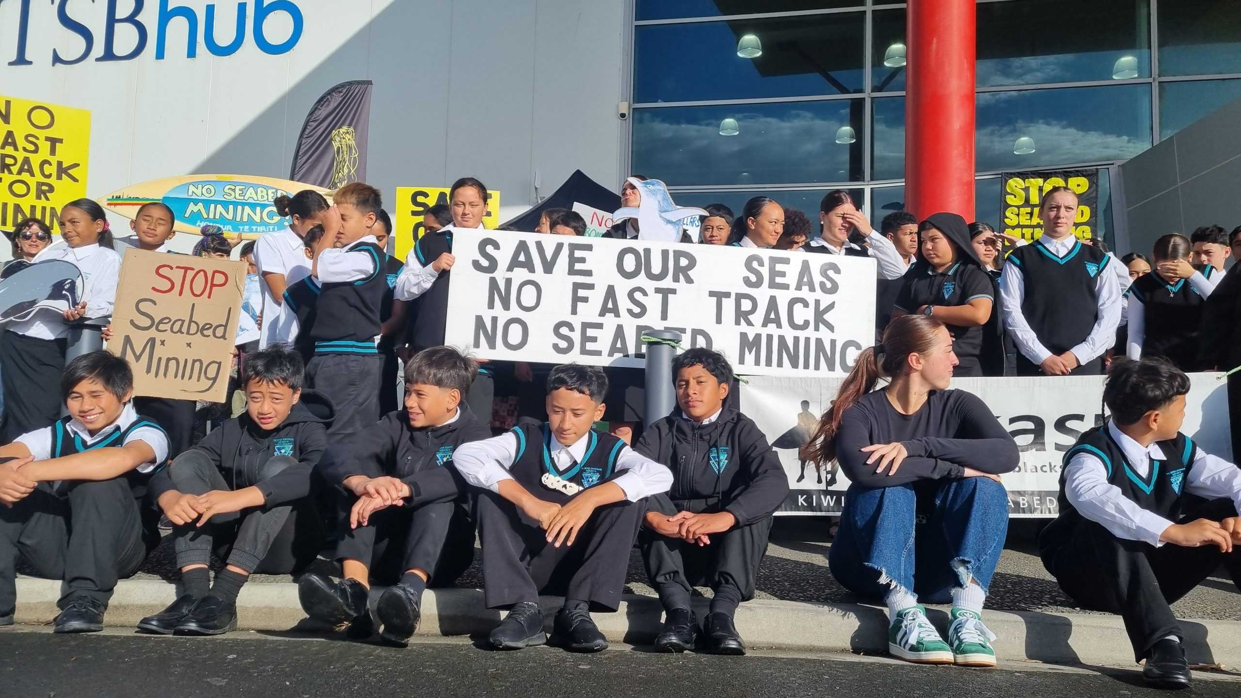 Rangatahi from Te Kura Kaupapa Māori o Ngāti Ruanui brought their opposition to seabed mining off Pātea to the doors of the EPA hearing. Photo / Robin Martin, RNZ