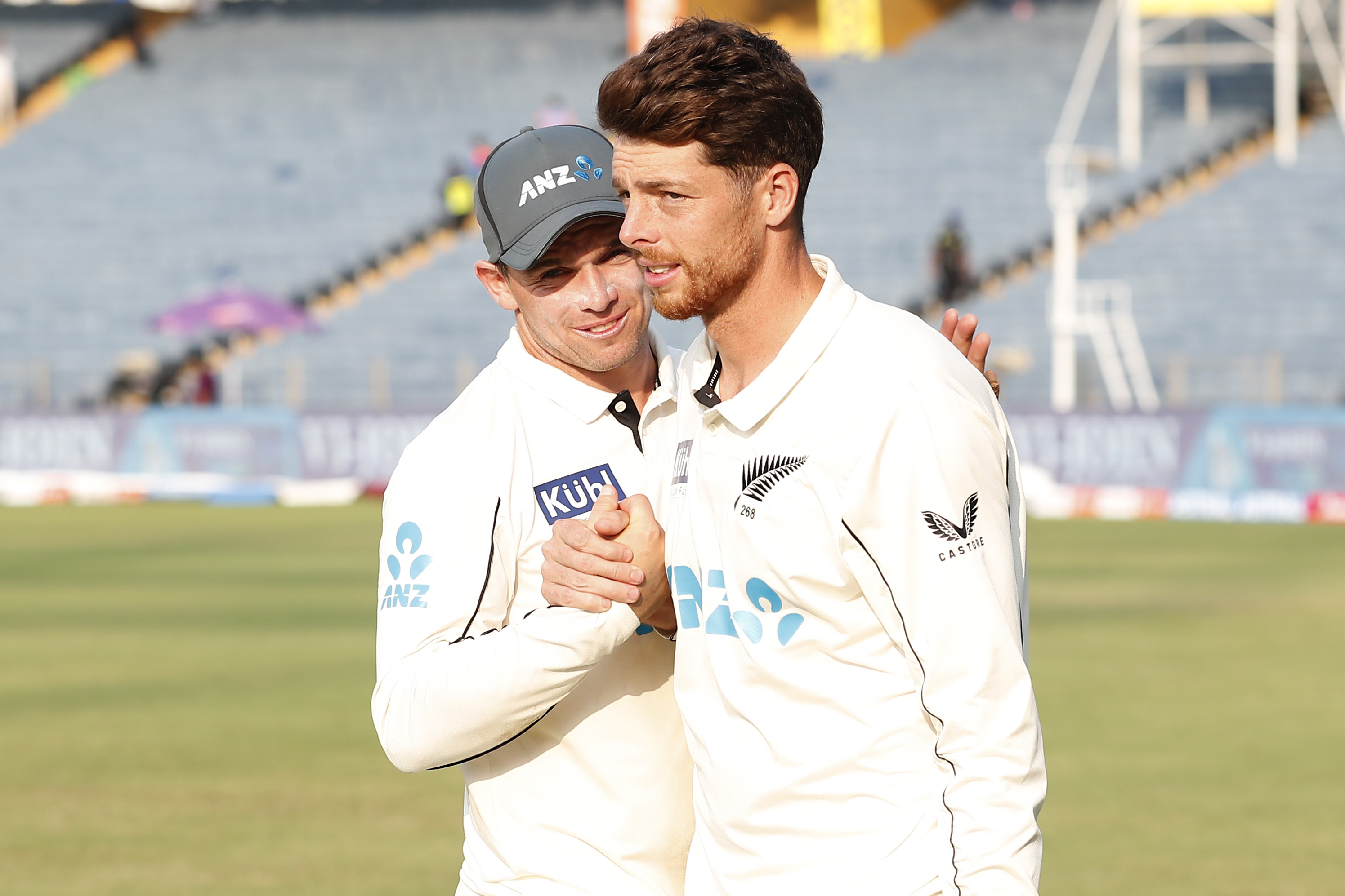 Mitchell Santner is congratulated by skipper Tom Latham. Photo / Photosport