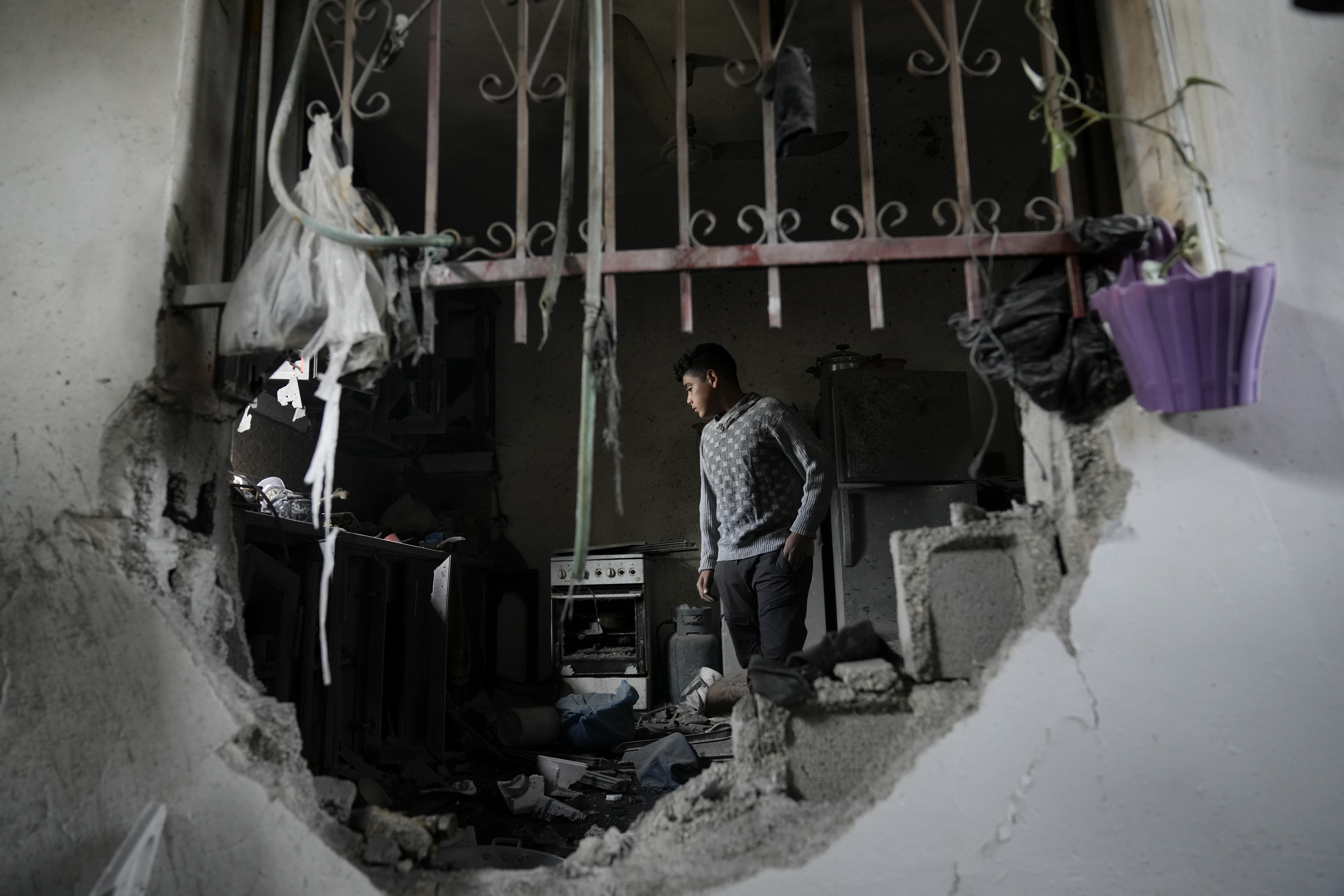 Palestinians inspect a house destroyed by Israeli forces during a military raid in the West Bank town of Tubas. Photo / AP