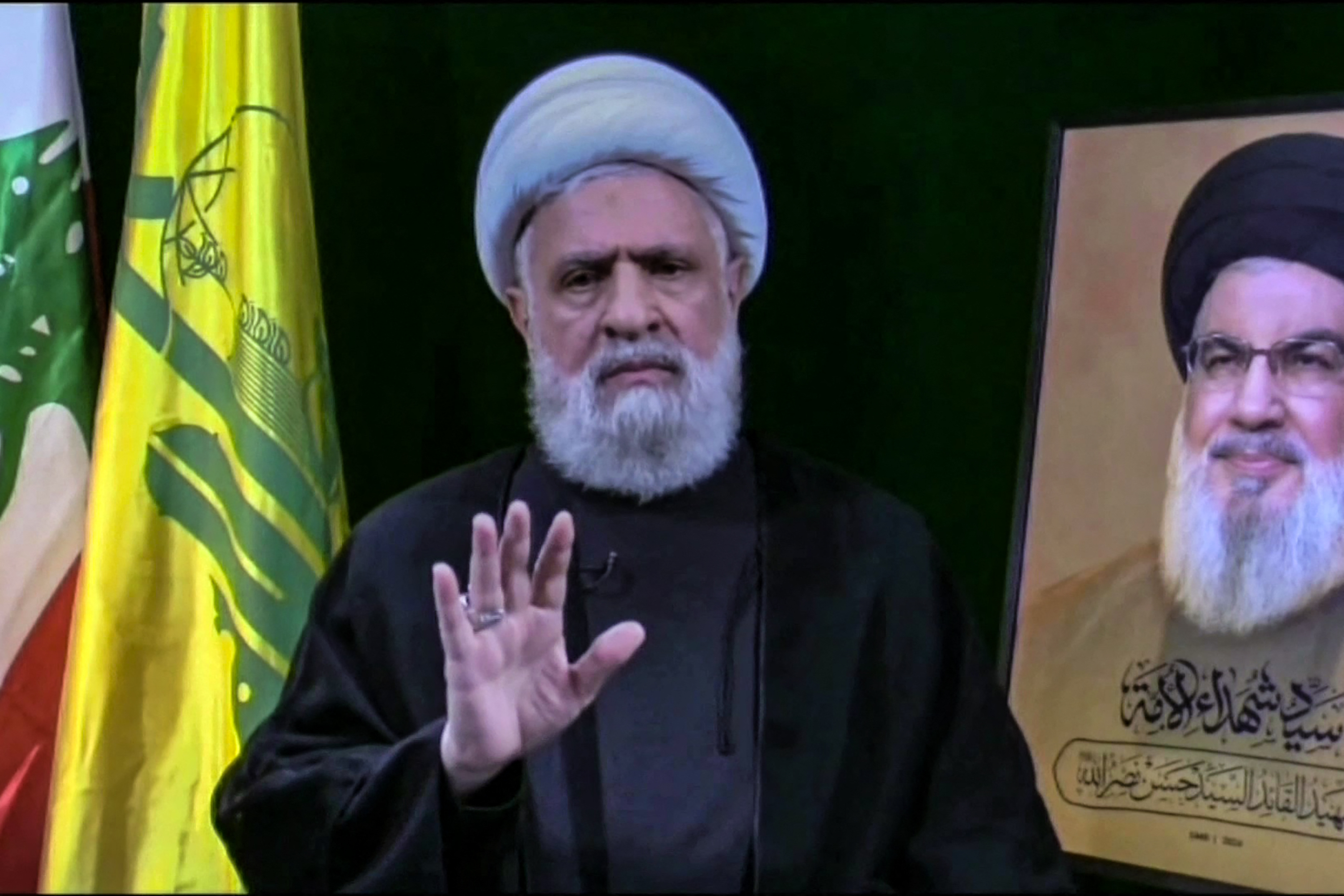 An image taken from Hezbollah's Al-Manar TV on November 6, 2024 showing Hezbollah chief Naim Qasem delivering a televised speech from an undisclosed location. Photo / AFP / Ho / Al-Manar