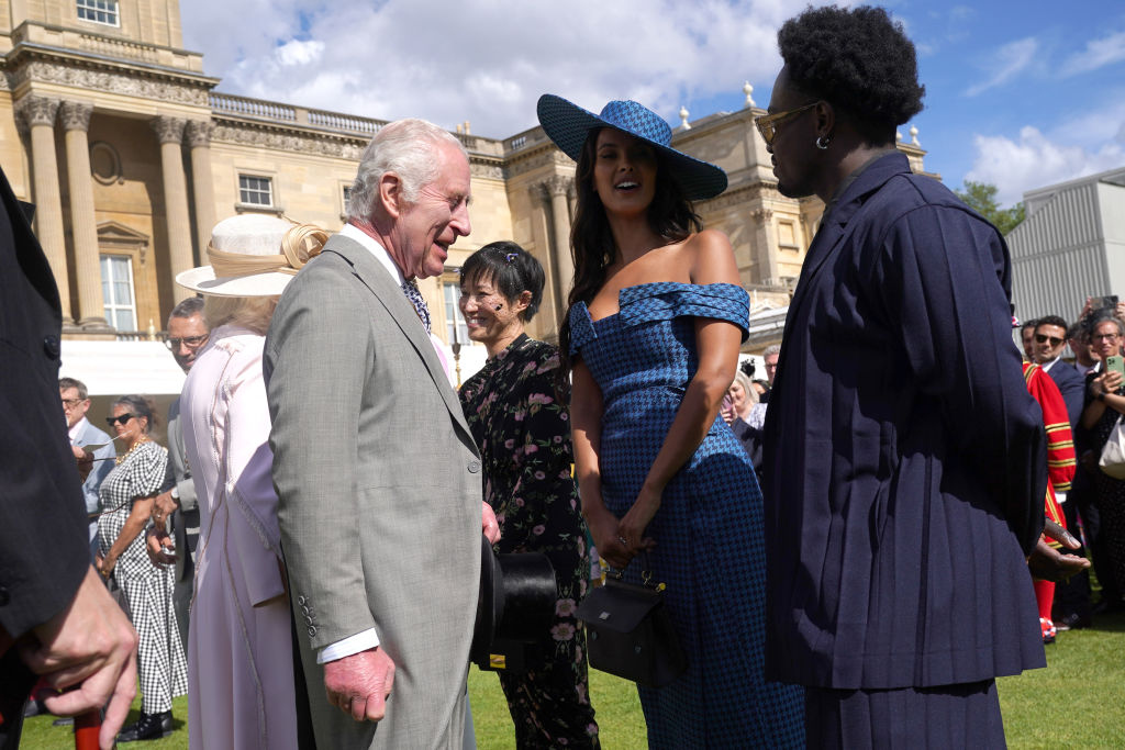 King Charles speaks with Maya Jama and Campbell Addy at The Sovereign's Creative Industries Garden Party. Photo / Getty Images