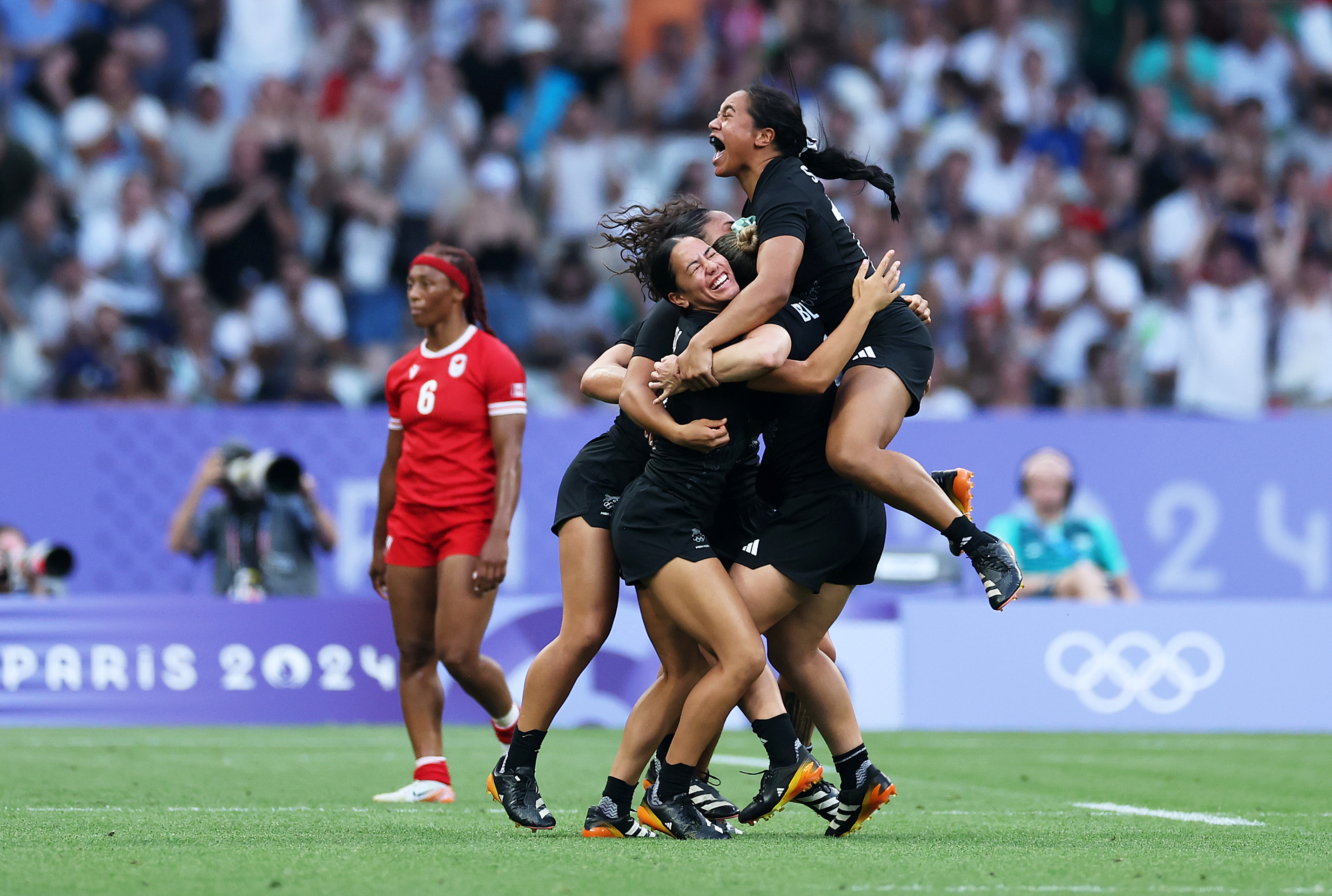 Celebratons following victory during the Women's Rugby Sevens gold medal match between Team New Zealand and Team Canada. Photo / Getty Images