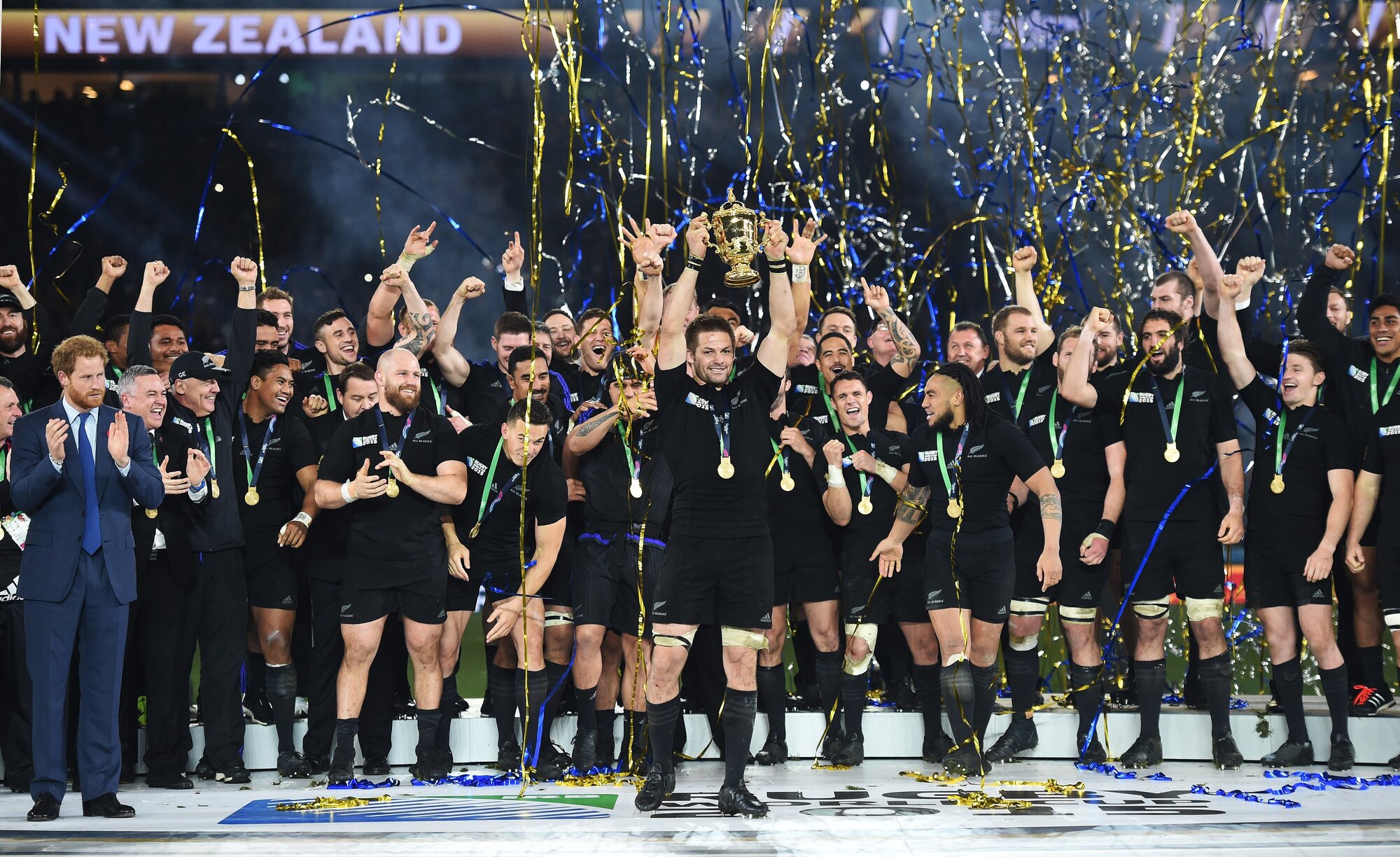 Richie McCaw holds aloft the Webb Ellis Trophy after winning the Rugby World Cup in 2015. Photo / Photosport
