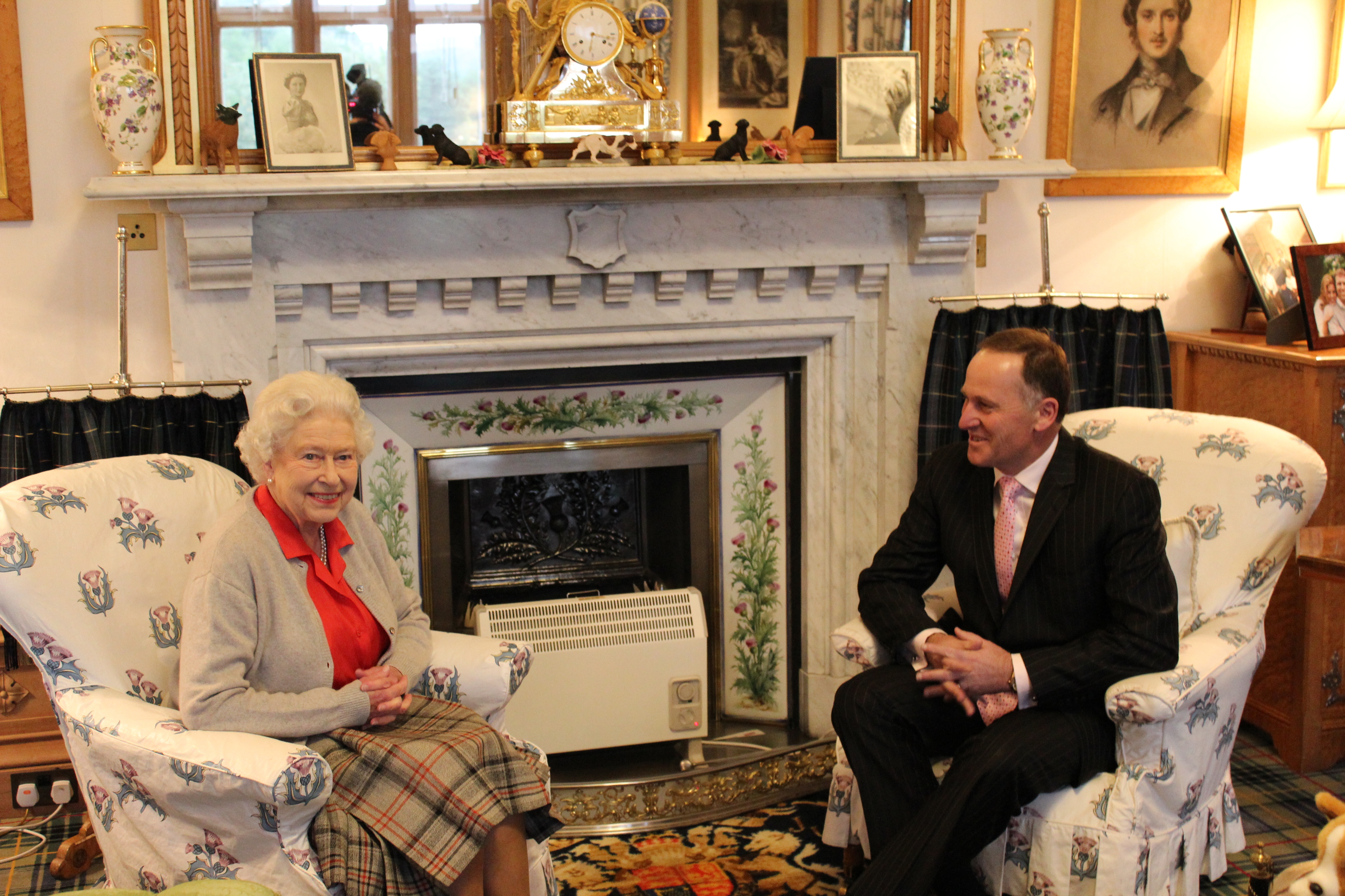 Ex-PM John Key with Majesty Queen Elizabeth II at Balmoral Castle, Scotland, in 2013. Photo / Claire Trevett