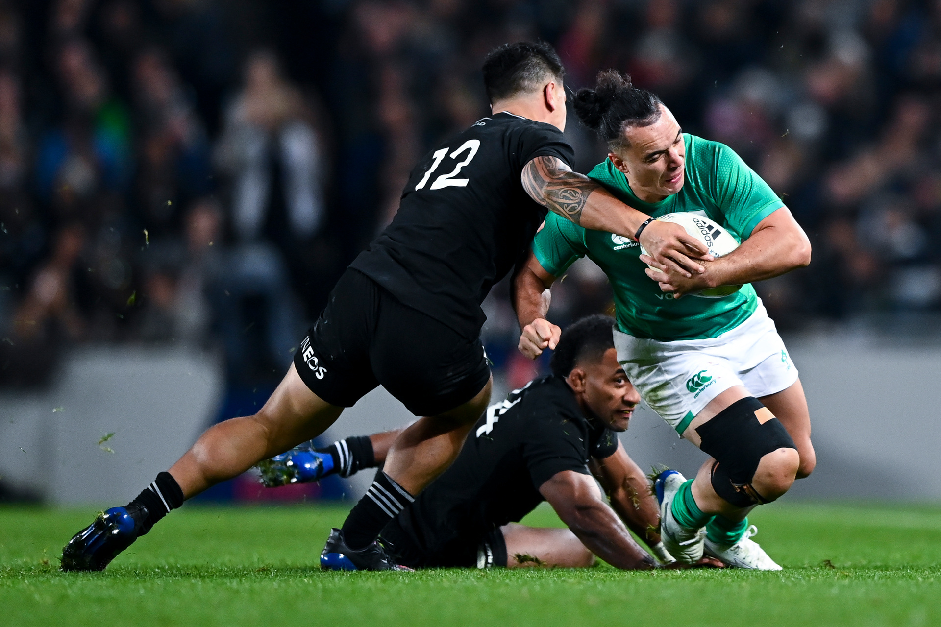 James Lowe meets the All Blacks defence last night at Eden Park. Photo / Getty Images