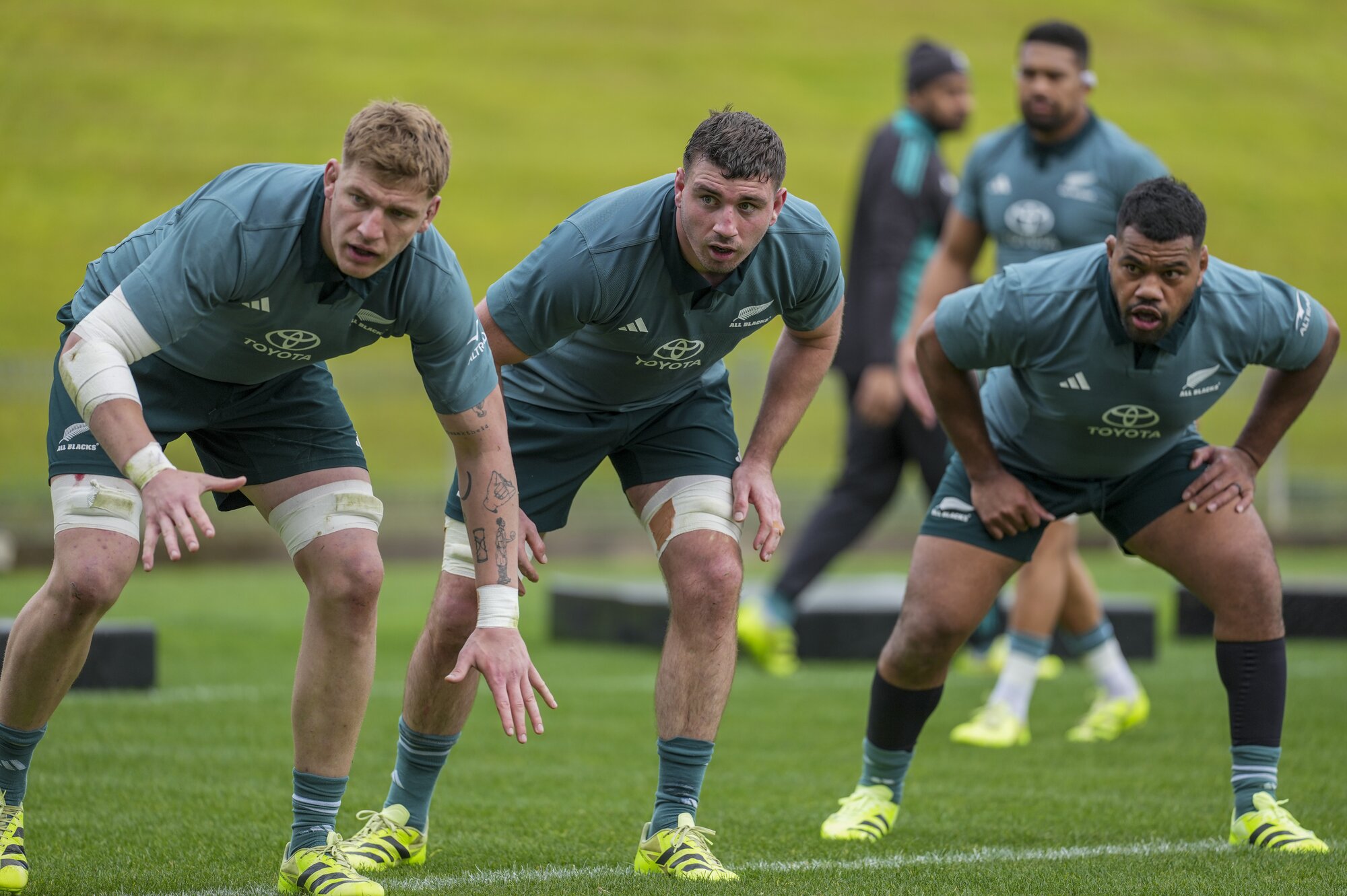Simon Parker lines up between Fabian Holland (left) and Samisoni Taukei’aho in an All Blacks training session. Photo / SmartFrame