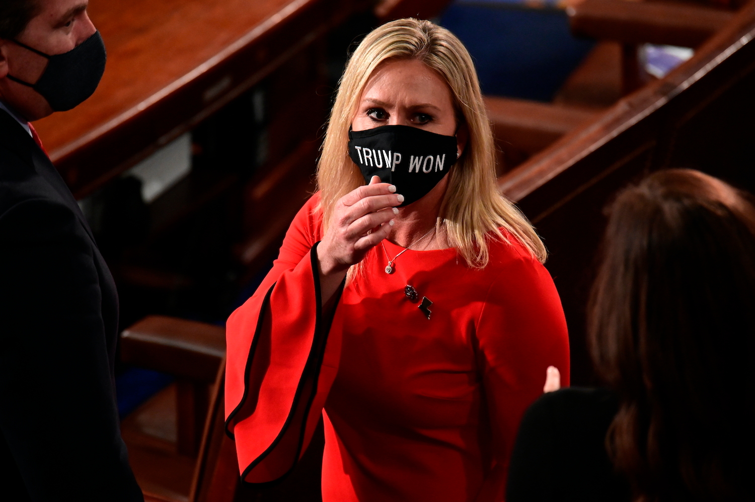 Rep. Marjorie Taylor Greene wears a 'Trump won' mask. Photo / AP