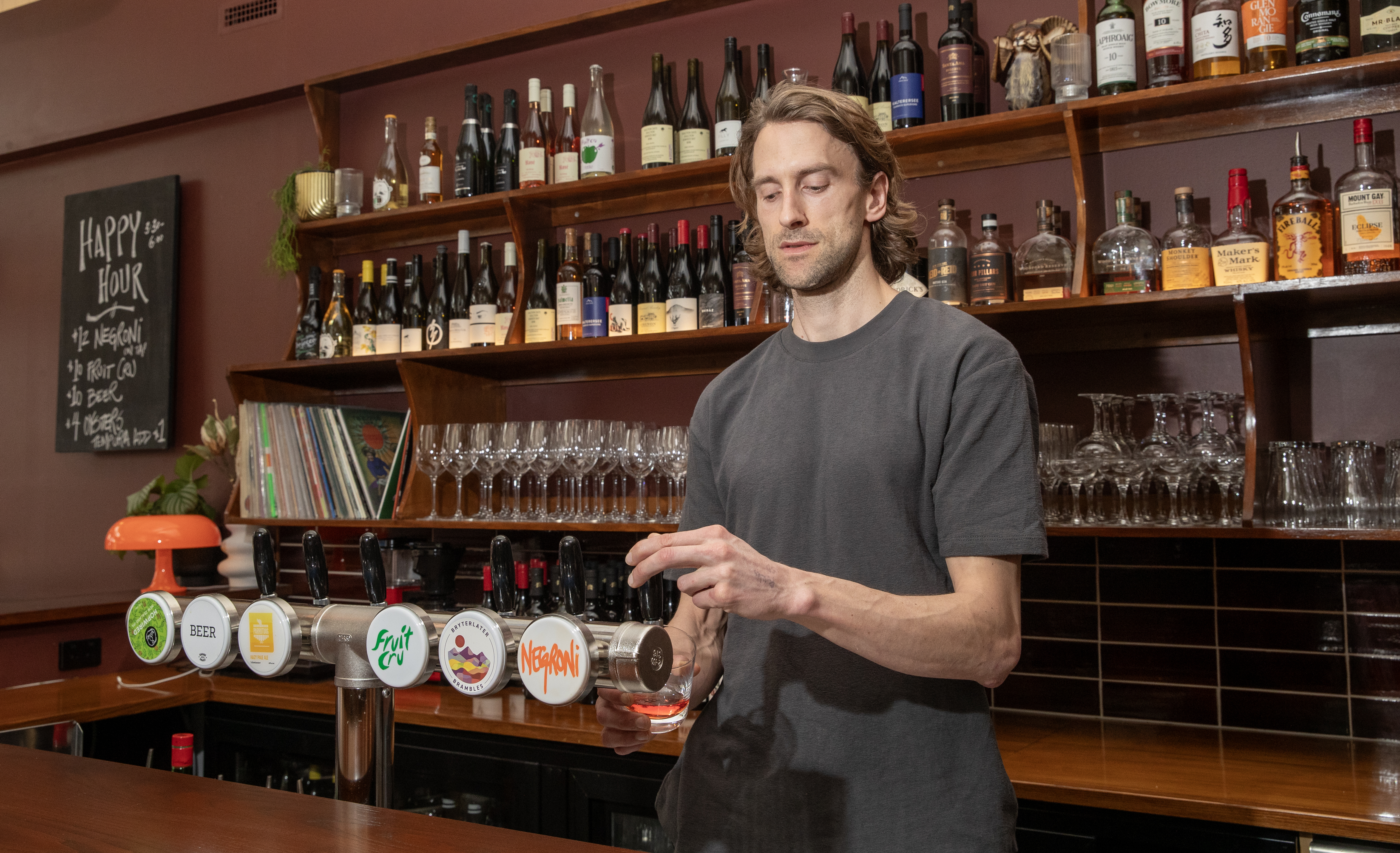 The Ram co-owner Harry McArthur pouring a negroni on tap. Photo / Mark Mitchell