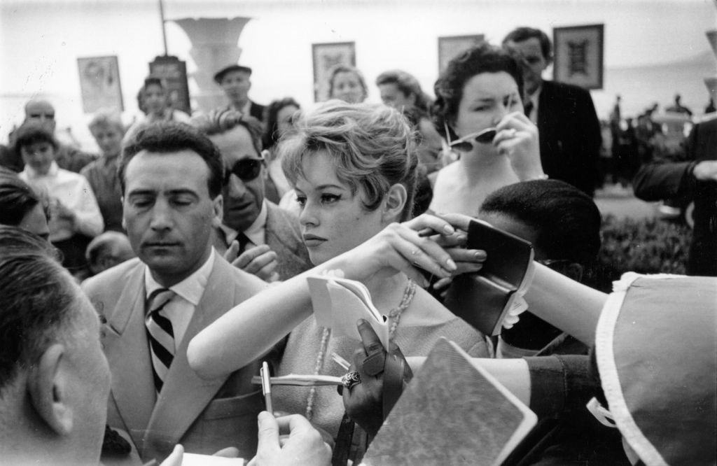 French actress Brigitte Bardot besieged by fans at the 1956 Cannes Film Festival. Photo / Getty Images