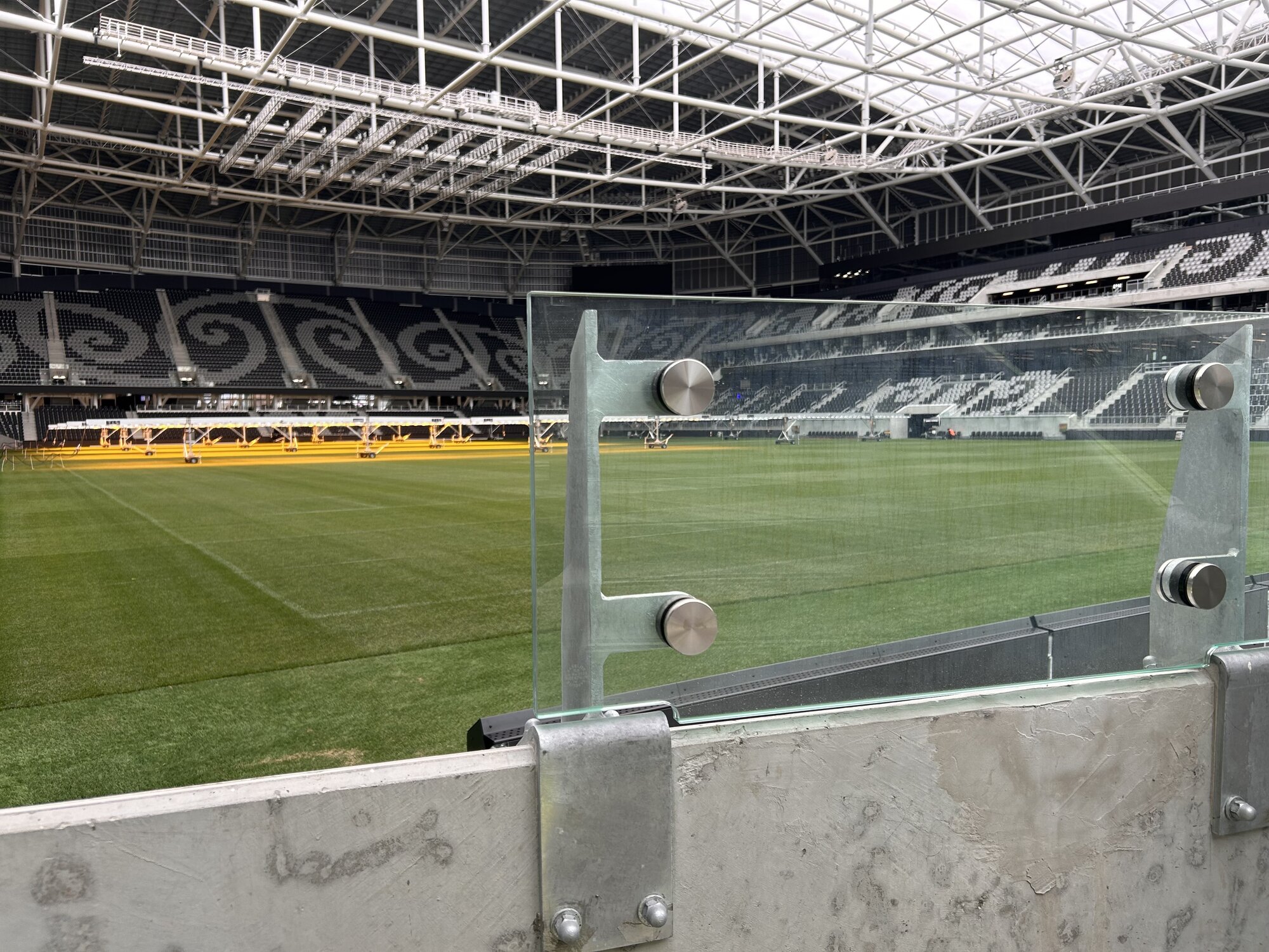 Restricted viewing. The safety barrier at the bottom of the stairs prevents people from tumbling over. It also prevents spectators in that seat from a full view. Also note the gangway in the roof rafters – a unique opportunity? Photo / Mike Thorpe 