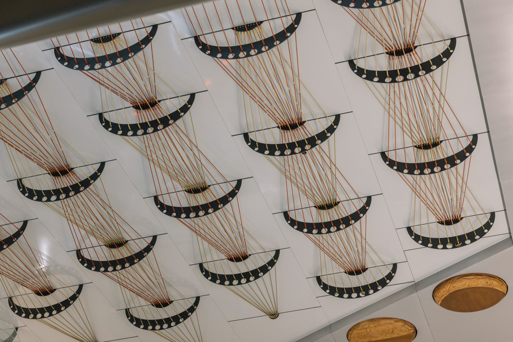Sun beams and moon phases - a closer look at the symbols at the new Karanga-a-Hape Station. Photo / Auckland Council
