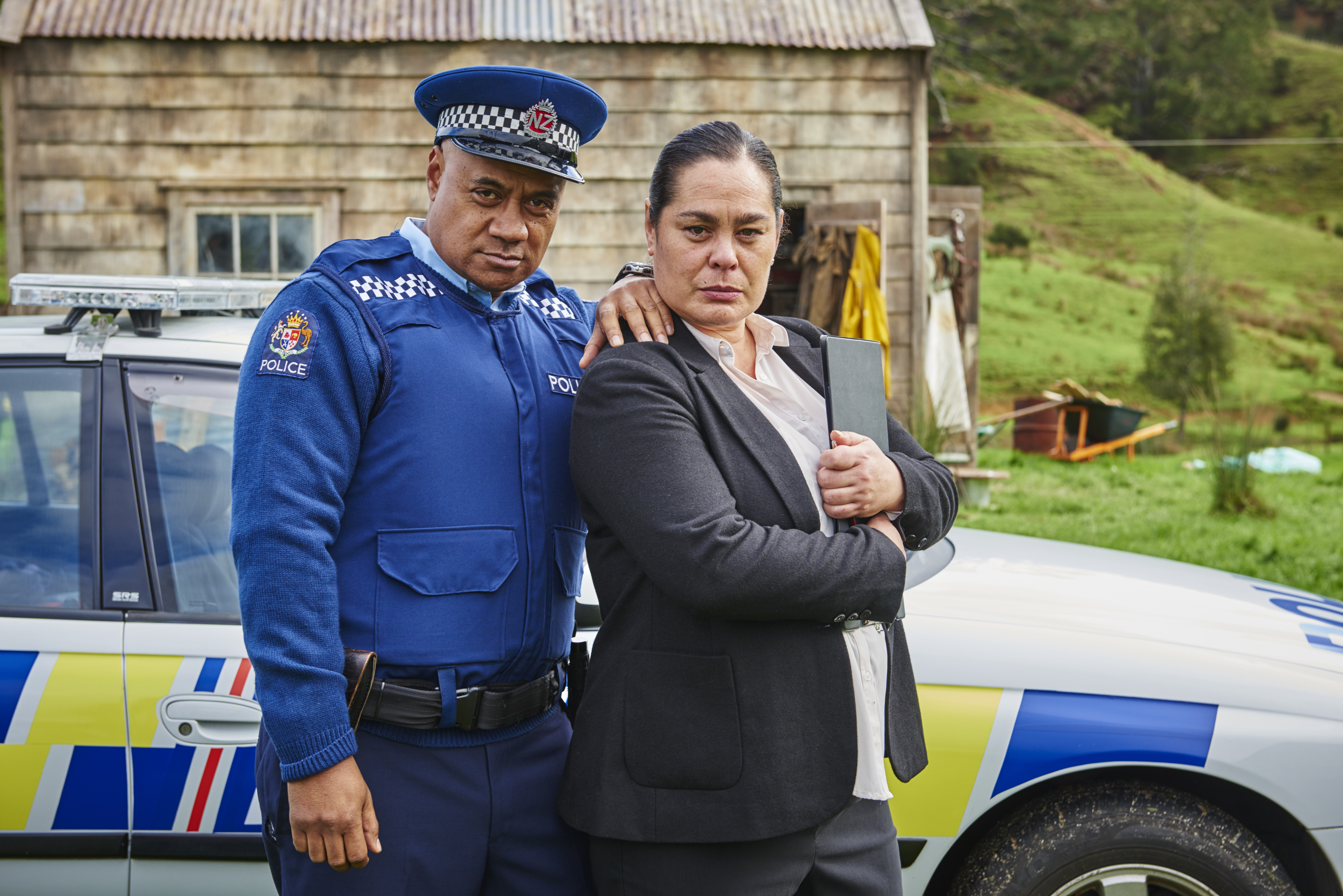 Oscar Kightley (left, with Rachel House) is a convincing dim local cop.