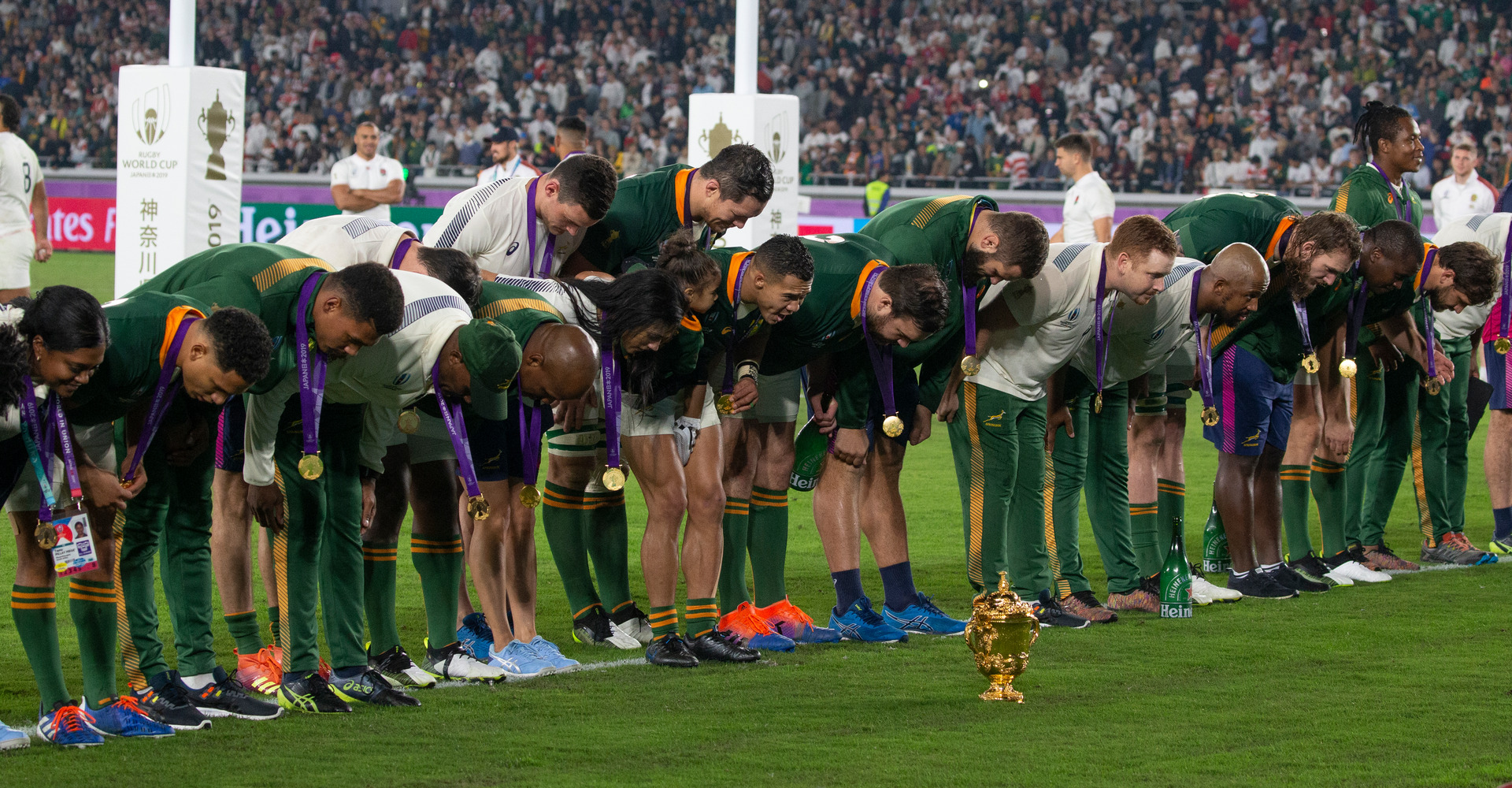 The Springboks, with the Webb Ellis Cup in front, bow to the crowd after their victory over England in the Rugby World Cup 2019 final played at International Stadium Yokohama. Photo / Mark Mitchell.