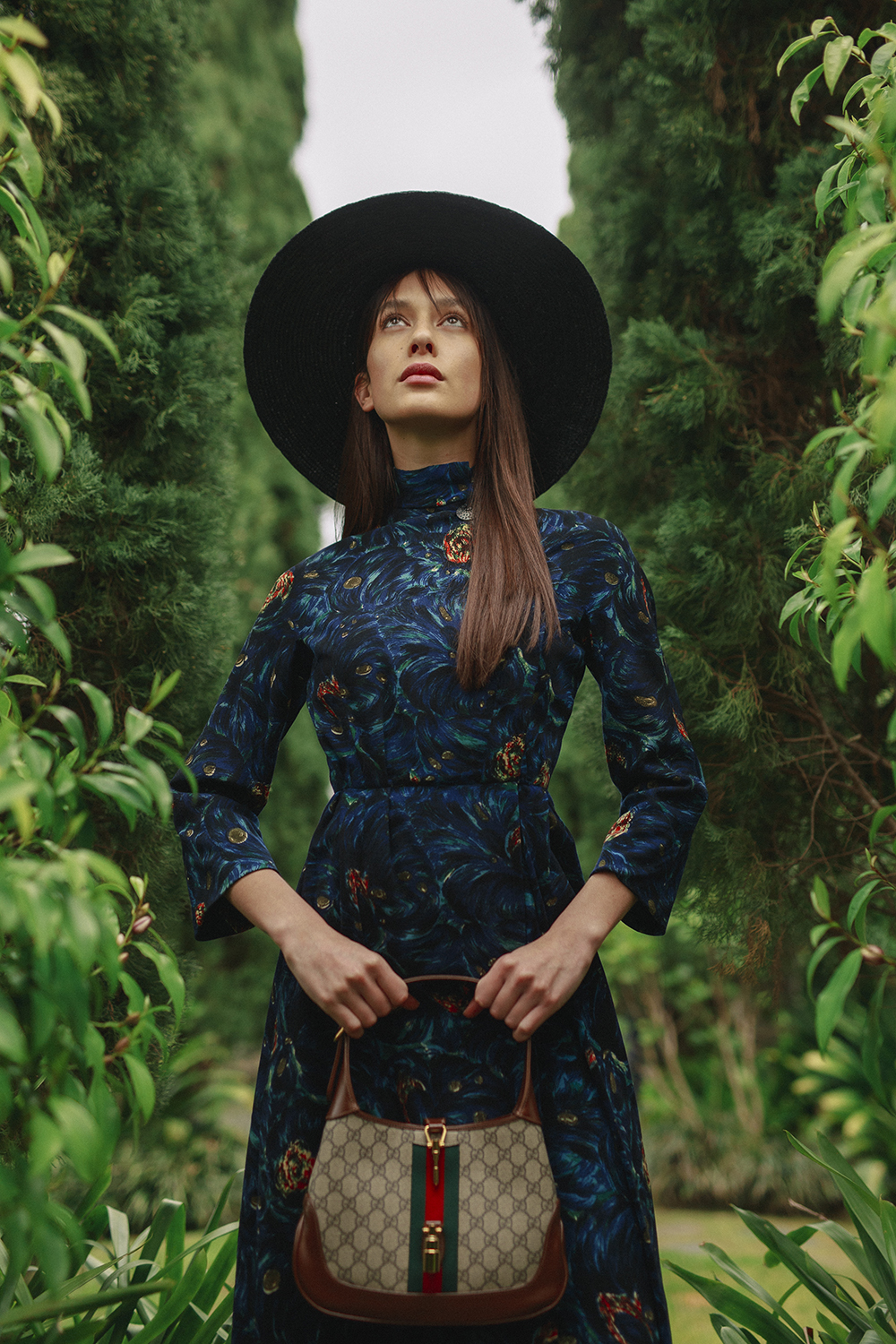 Manahou Mackay wears vintage dress from Painted Bird Vintage, a hat from Hills Hats and a Gucci 'Jackie 1961' handbag. Photo / Hohua Ropate Kurene