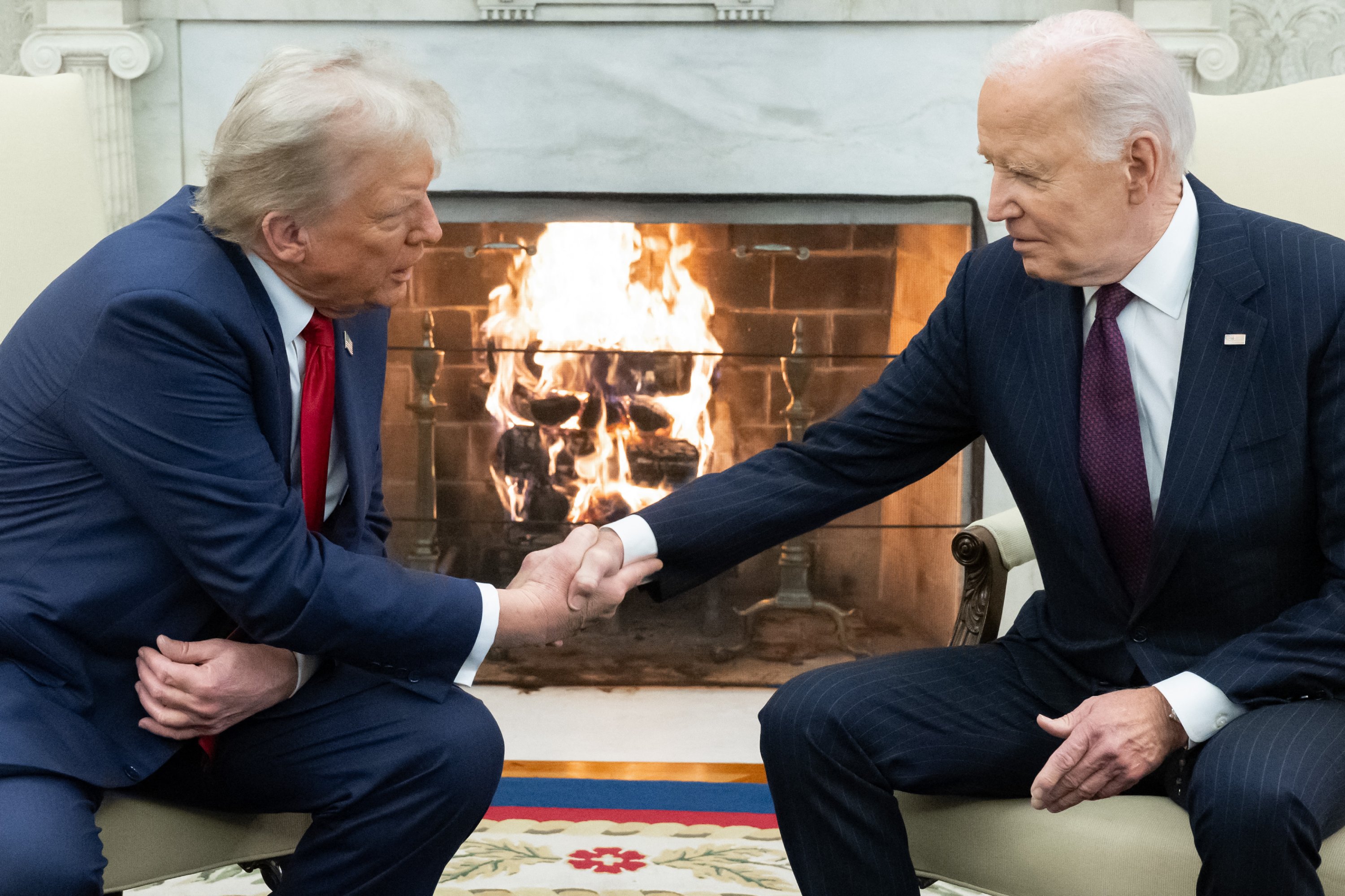 US President Joe Biden shakes hands with US President-elect Donald Trump during a meeting in the Oval Office of the White House in Washington, DC. Photo / AFP