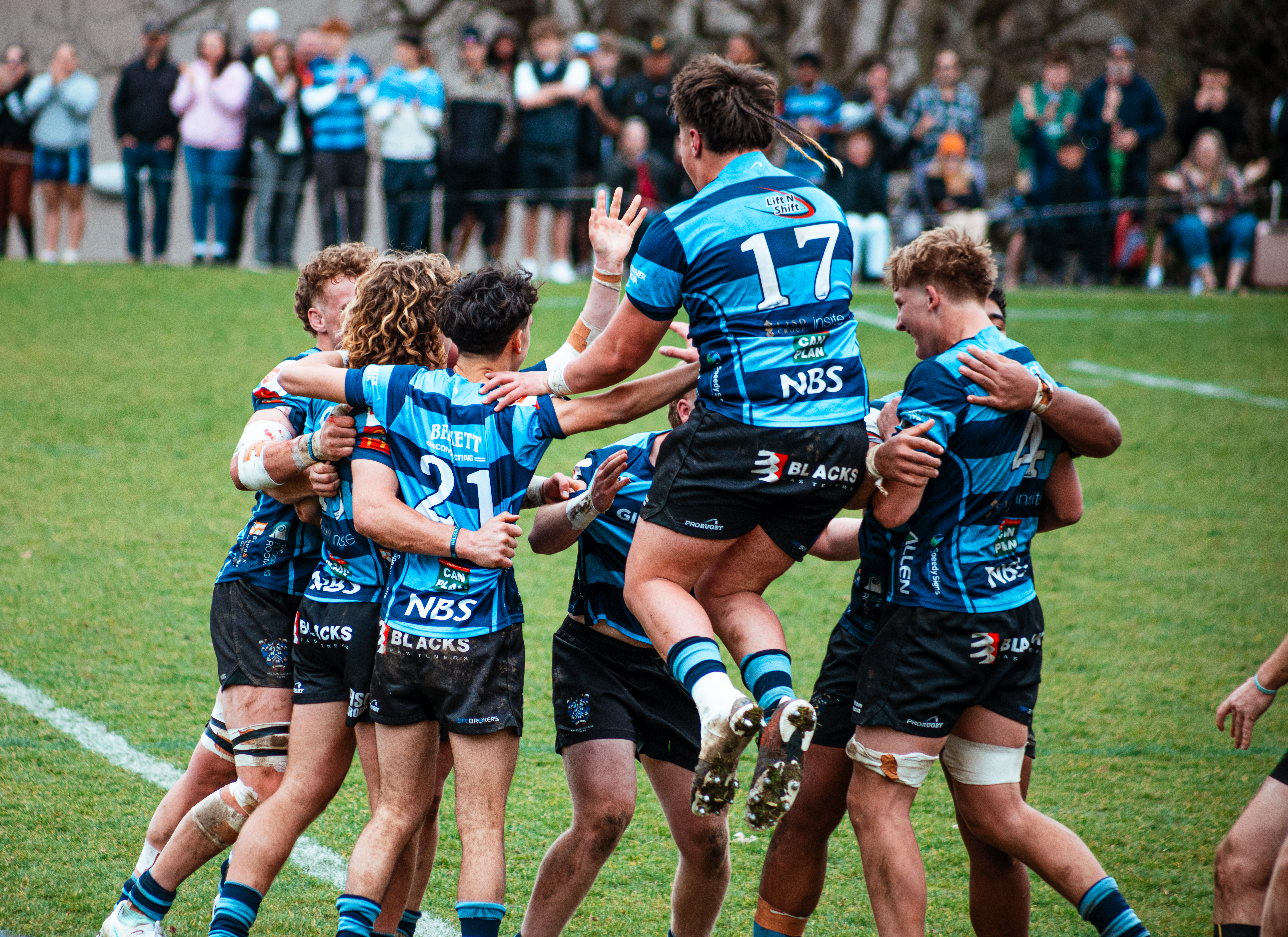 Nelson College celebrate a 20-17 victory over CBHS in the final of the Miles Toyota First XV Premiership. Photo / JDW Photography