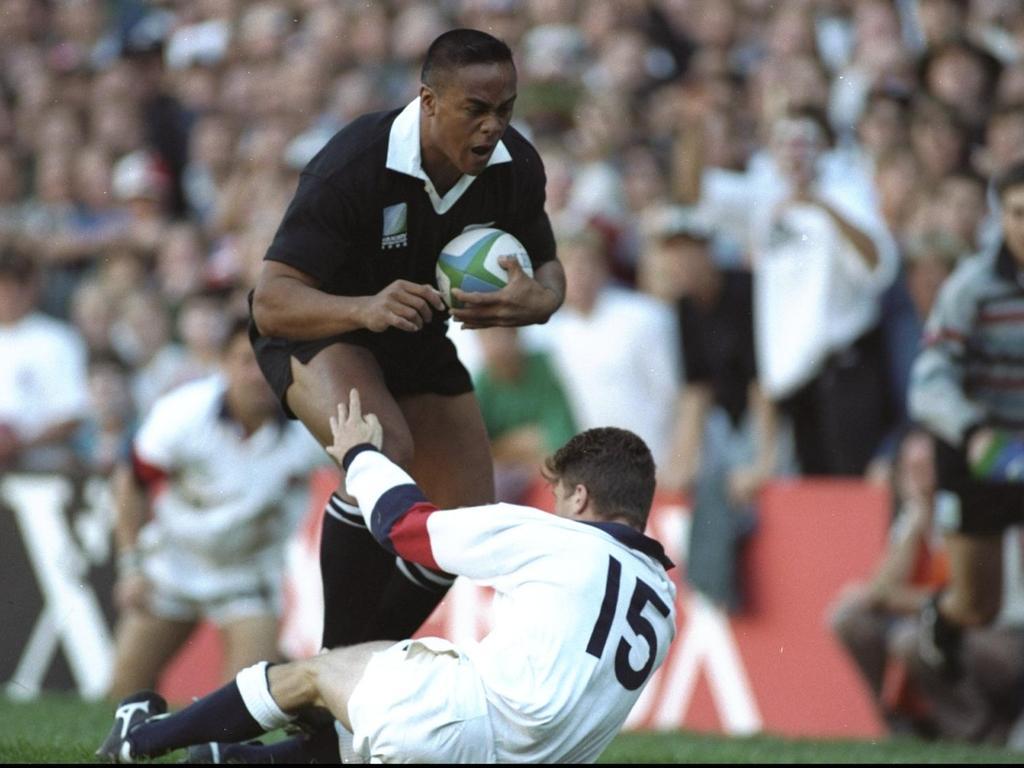 Jonah Lomu bowls over England's Mike Catt to score just two minutes into the 1995 semifinal.
Photo / Allsport