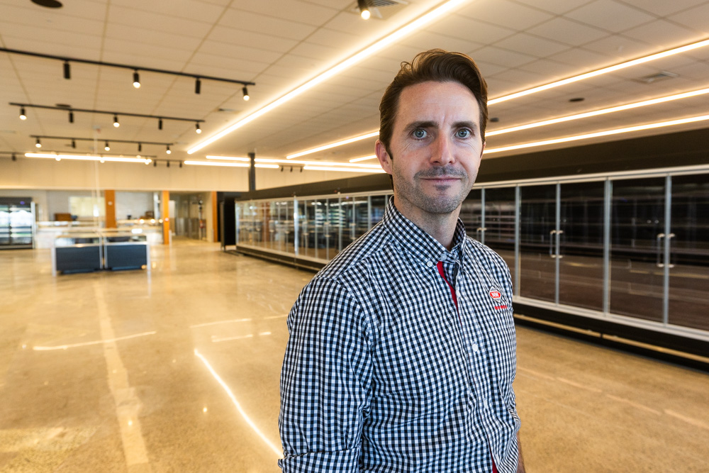 From bank IT business analyst to supermarket owner: Scott Jackson inside the new $50 million New World Te Atatū store. Photo / Jason Dorday