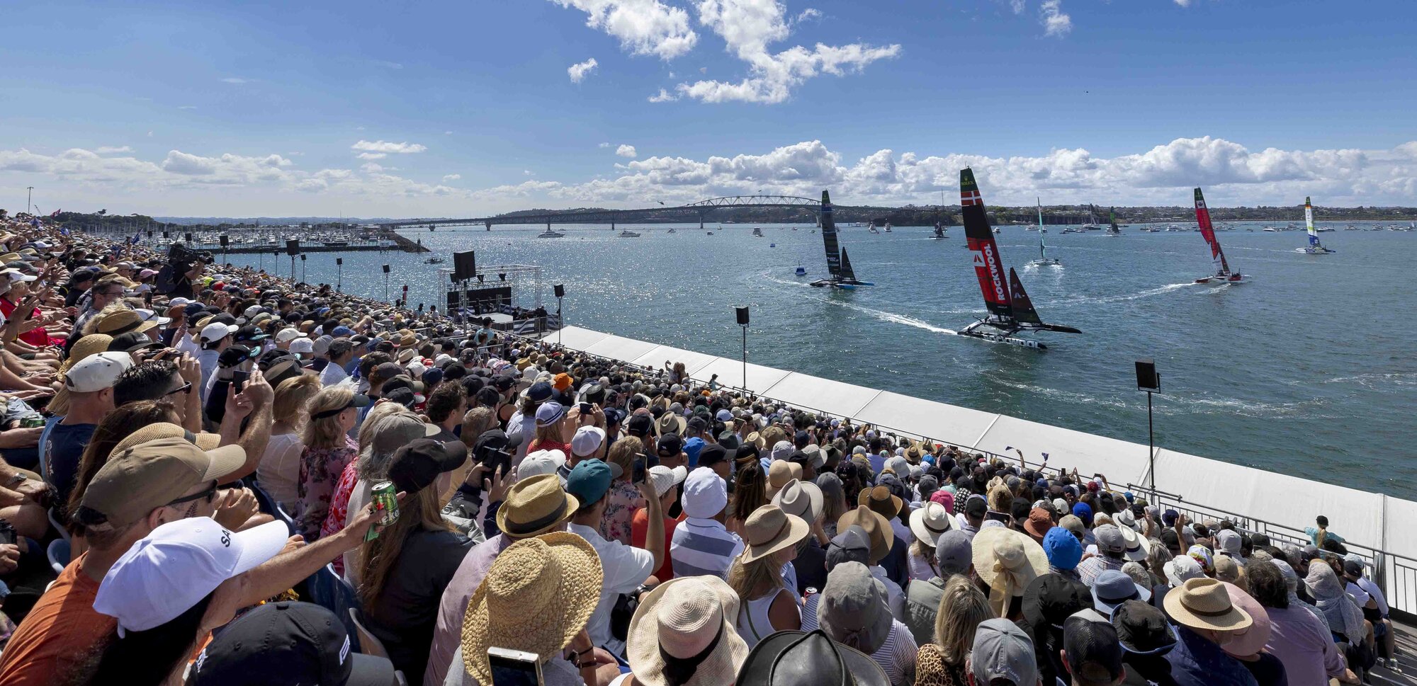 Spectators watch as the SailGP boats compete in Auckland. Photo / SailGP