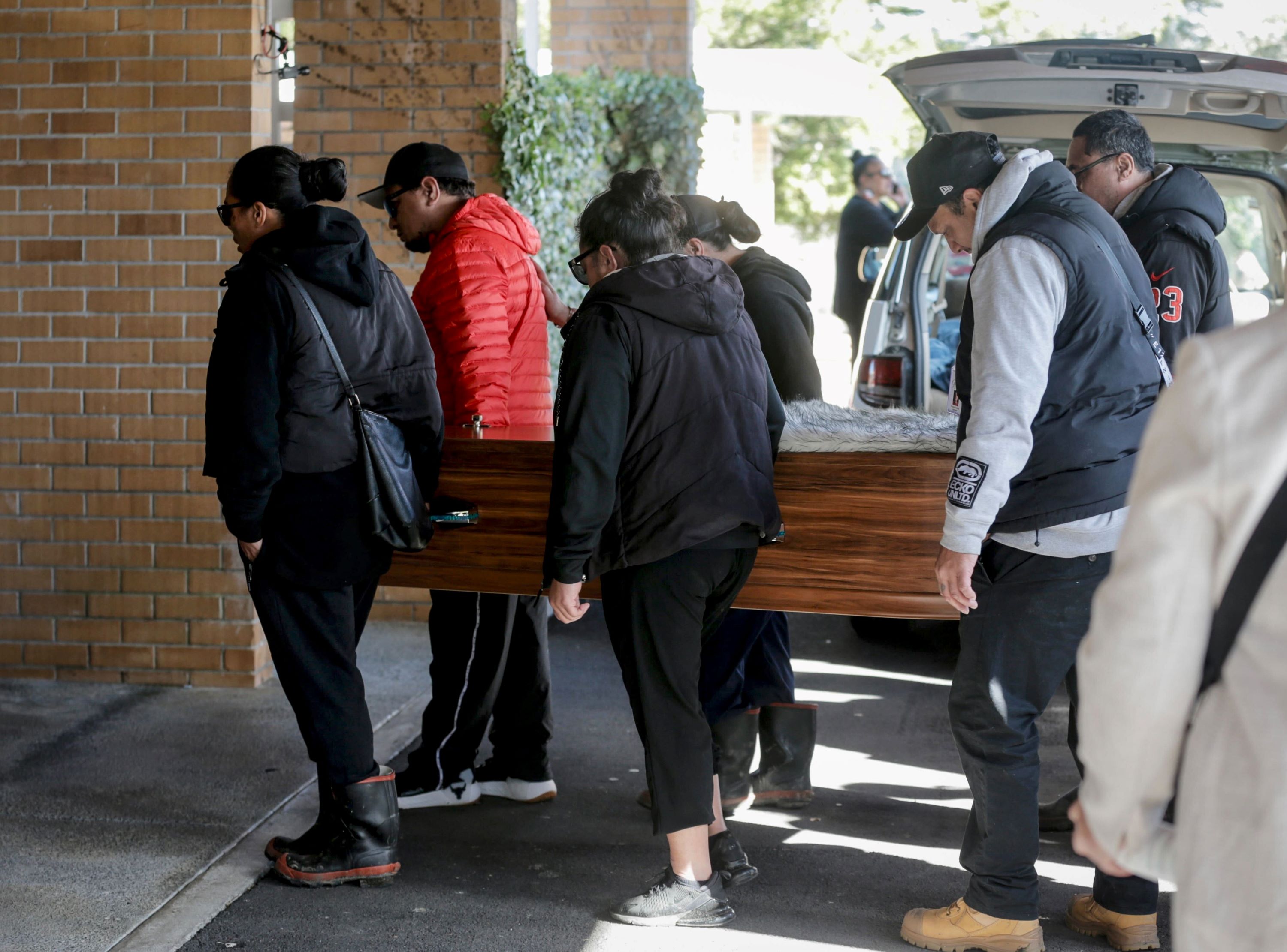 Pallbearers at Jo Sione-Lauaki's funeral at Schnapper Rock Crematorium Chapel in Albany, Auckland this morning. Photo / Alex Burton 