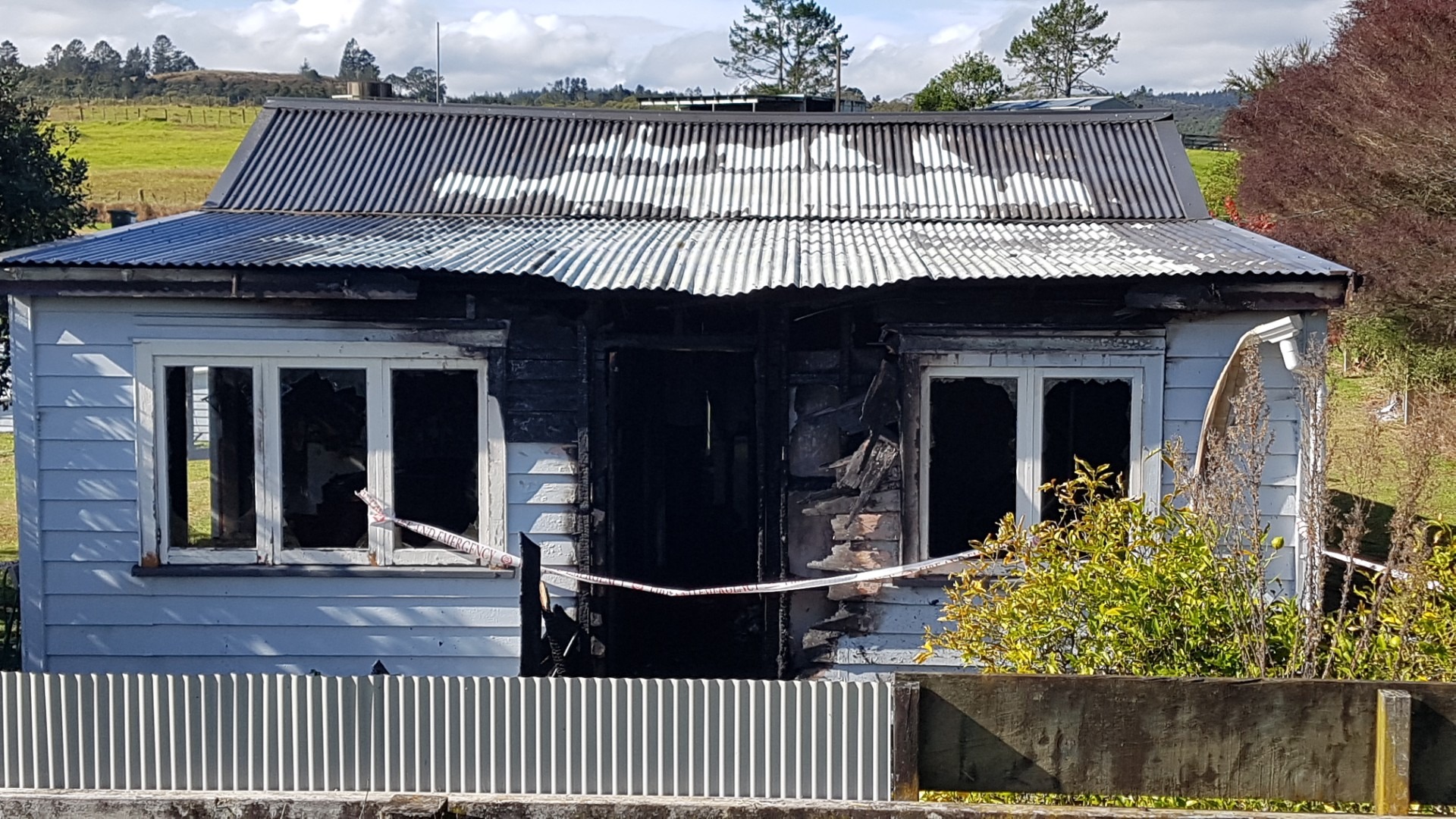 A house on Buchanan St, Hikurangi, that was badly damaged by fire on Saturday night.