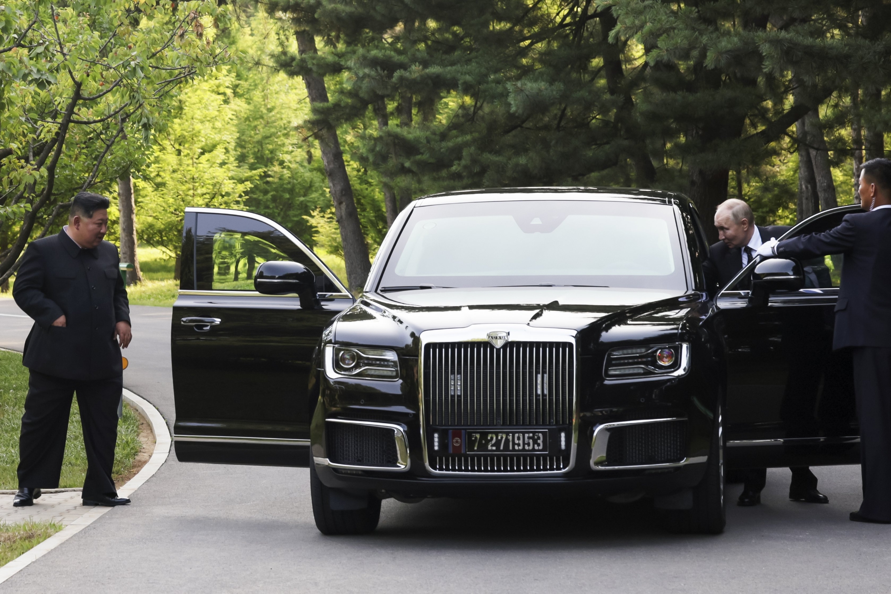 Kim Jong Un (left), and Vladimir Putin prepare to drive a Russian Aurus limousine during their meeting in Pyongyang. Photo / Sputnik, Kremlin Pool Photo via AP