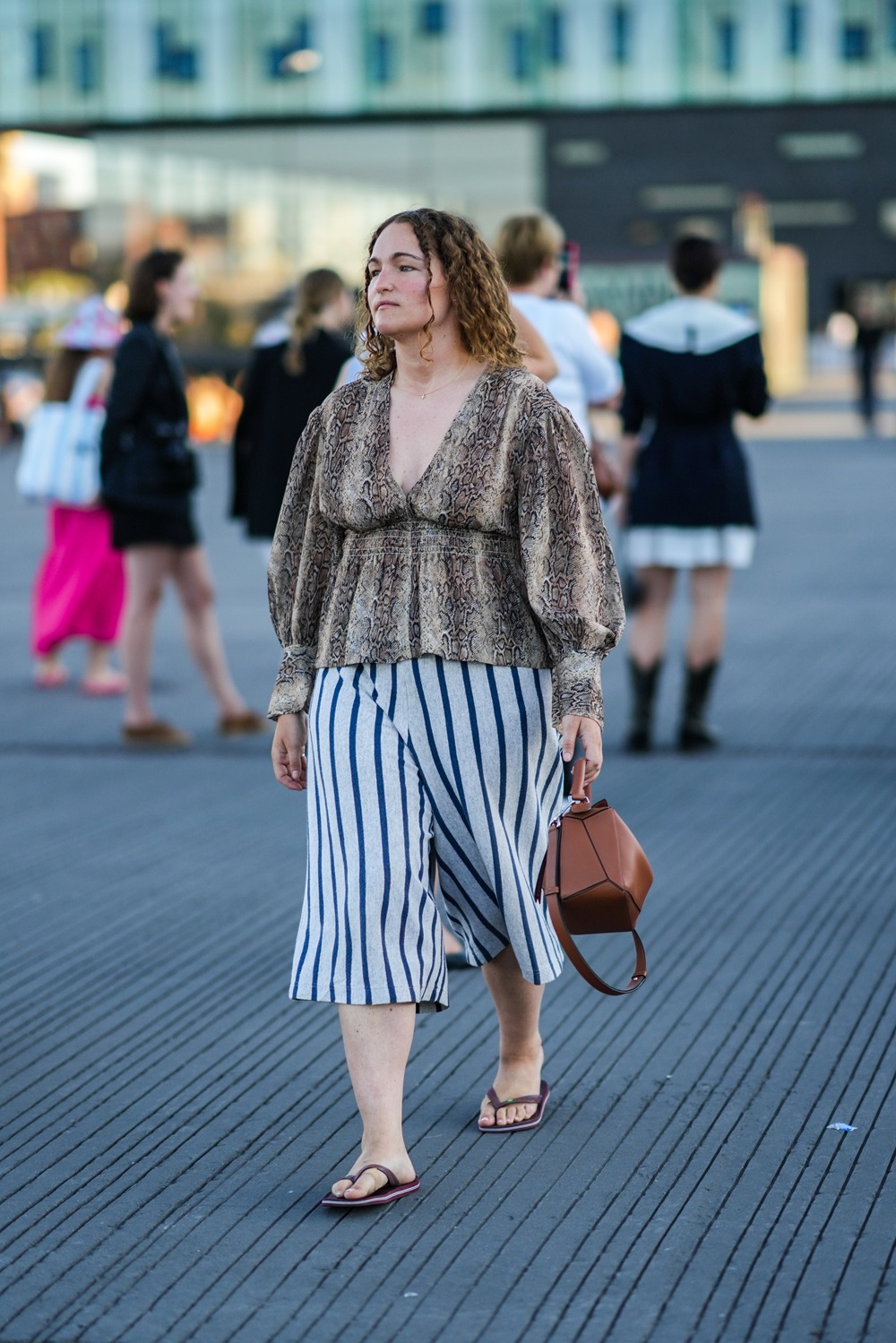 A guest wears a pair of Havaianas during Copenhagen Fashion Week spring/summer 2023. Photo / Getty Images