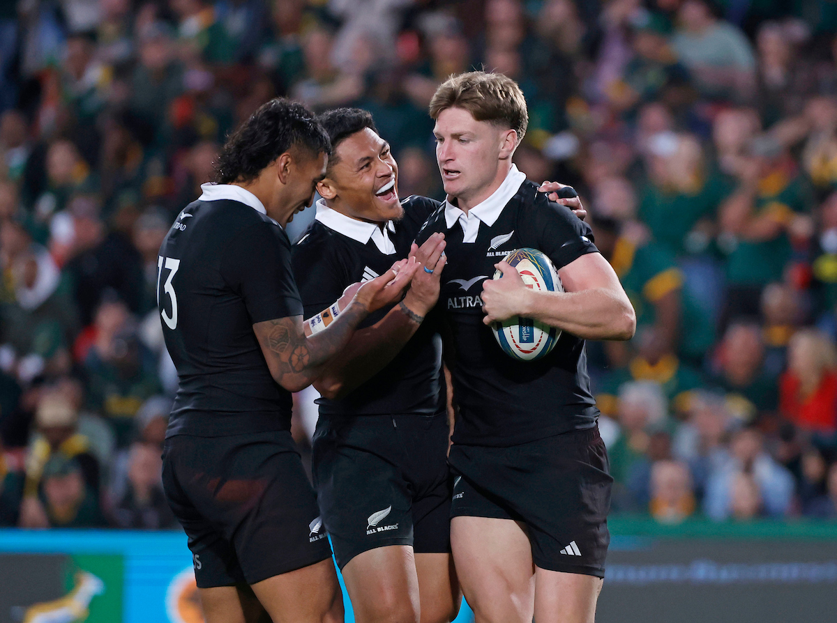 Rieko Ioane, Caleb Clarke and Jordie Barrett celebrate a try against South Africa. Photo / Photosport