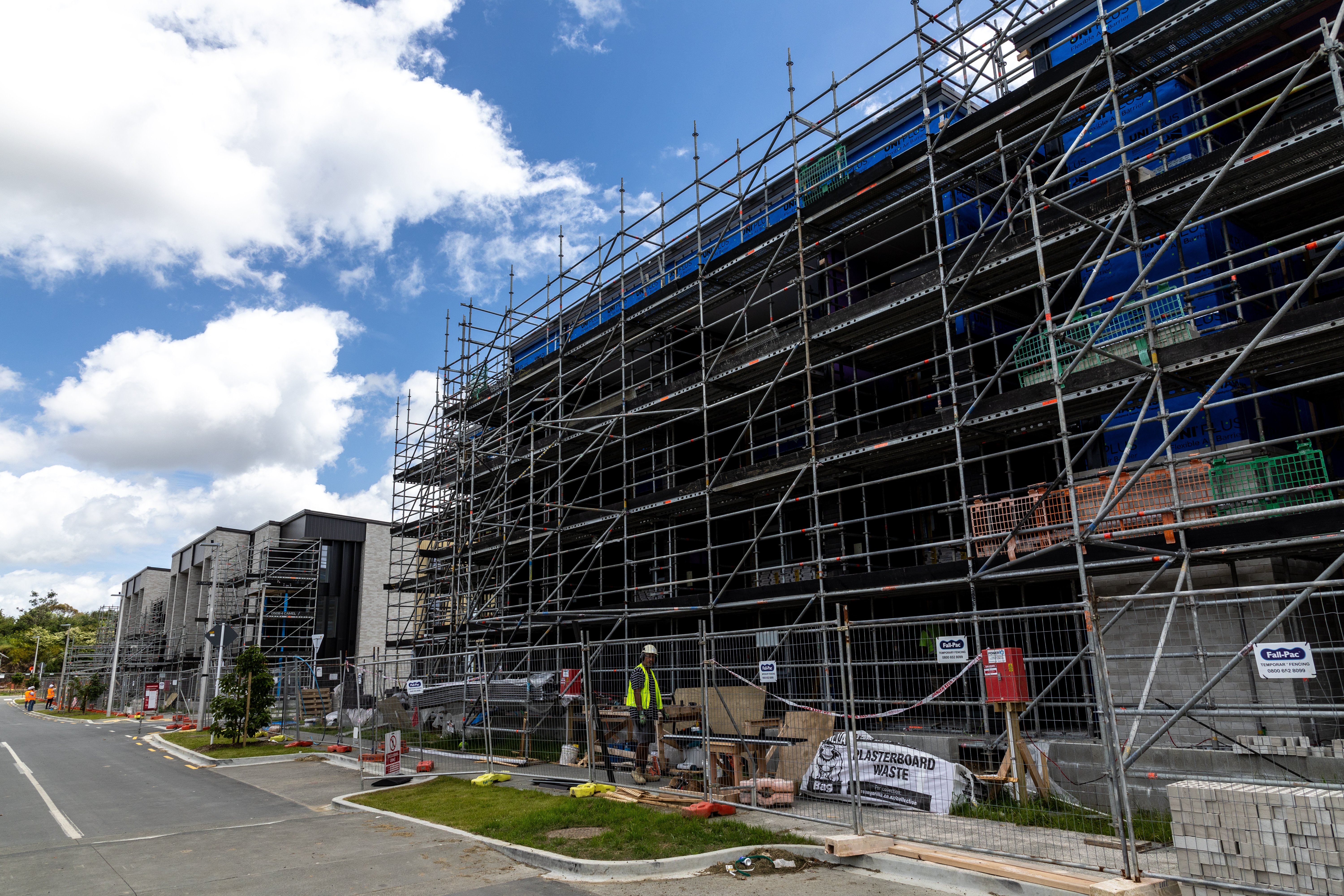 First terraced homes in the heart of the ex-quarry now nearing completion for residences to move into early next year. Photo / Michael Craig