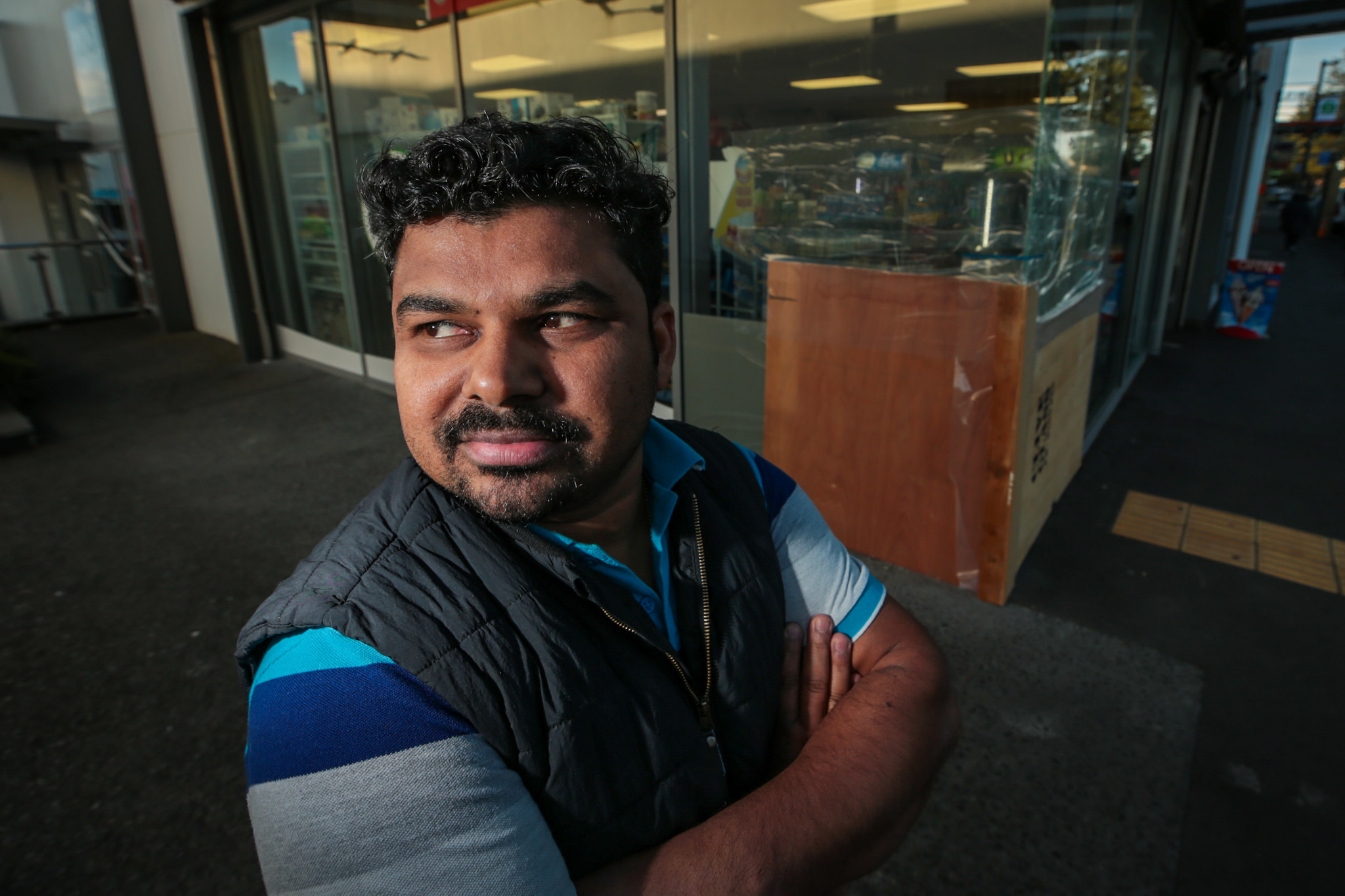 Store owner Binu Thomas says he is struggling with stress and he fears for the safety of his young children. Photo Paul Taylor