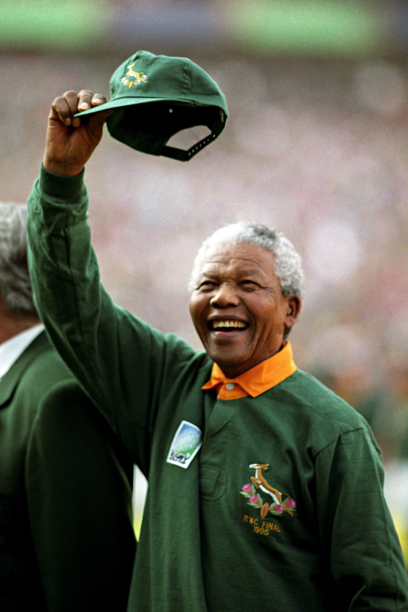 President Nelson Mandela rallies the crowd at the 1995 Rugby World Cup final. Photo / Getty Images