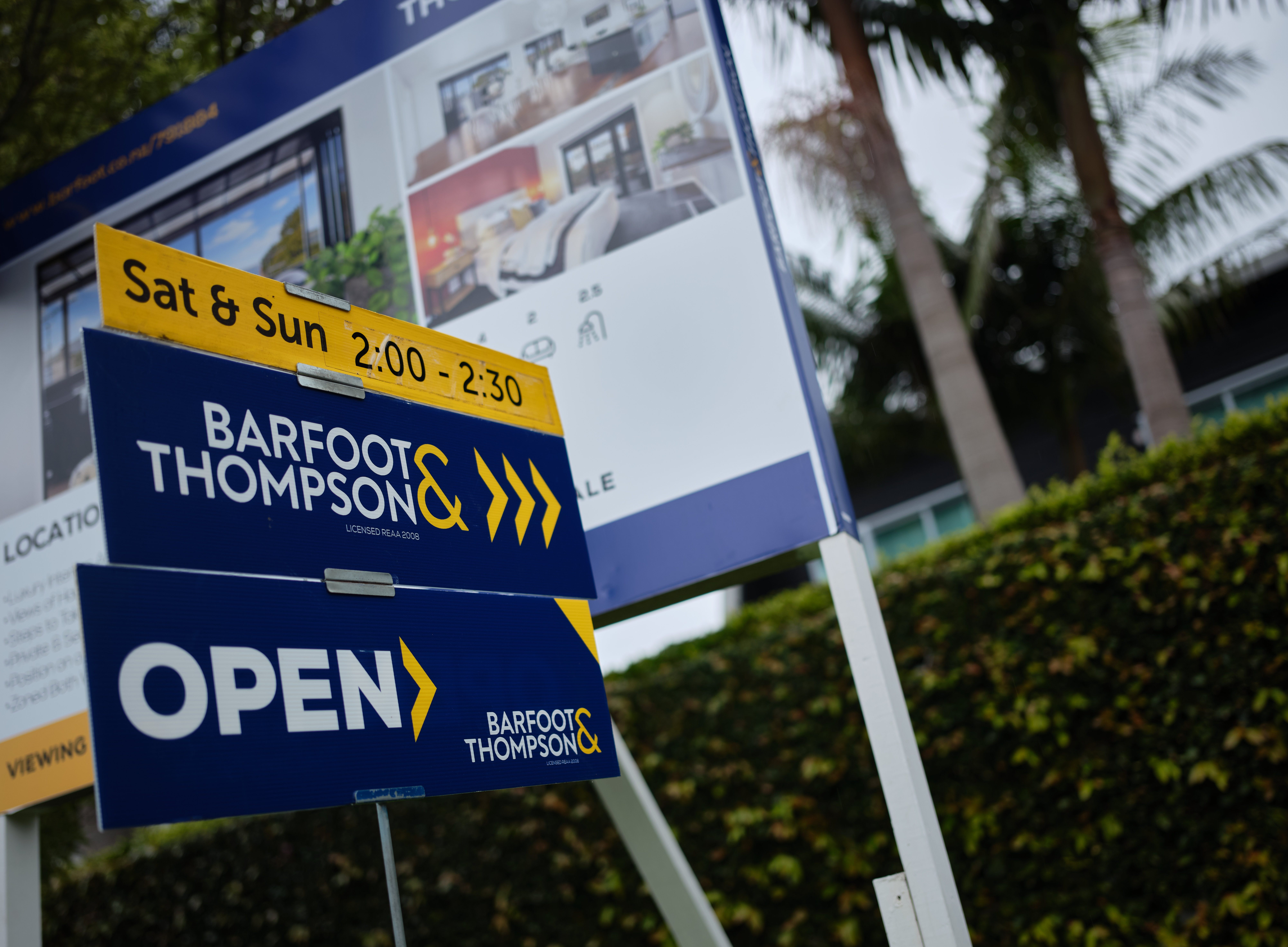 For sale signs outside a house in Auckland. Photo / Ted Baghurst
