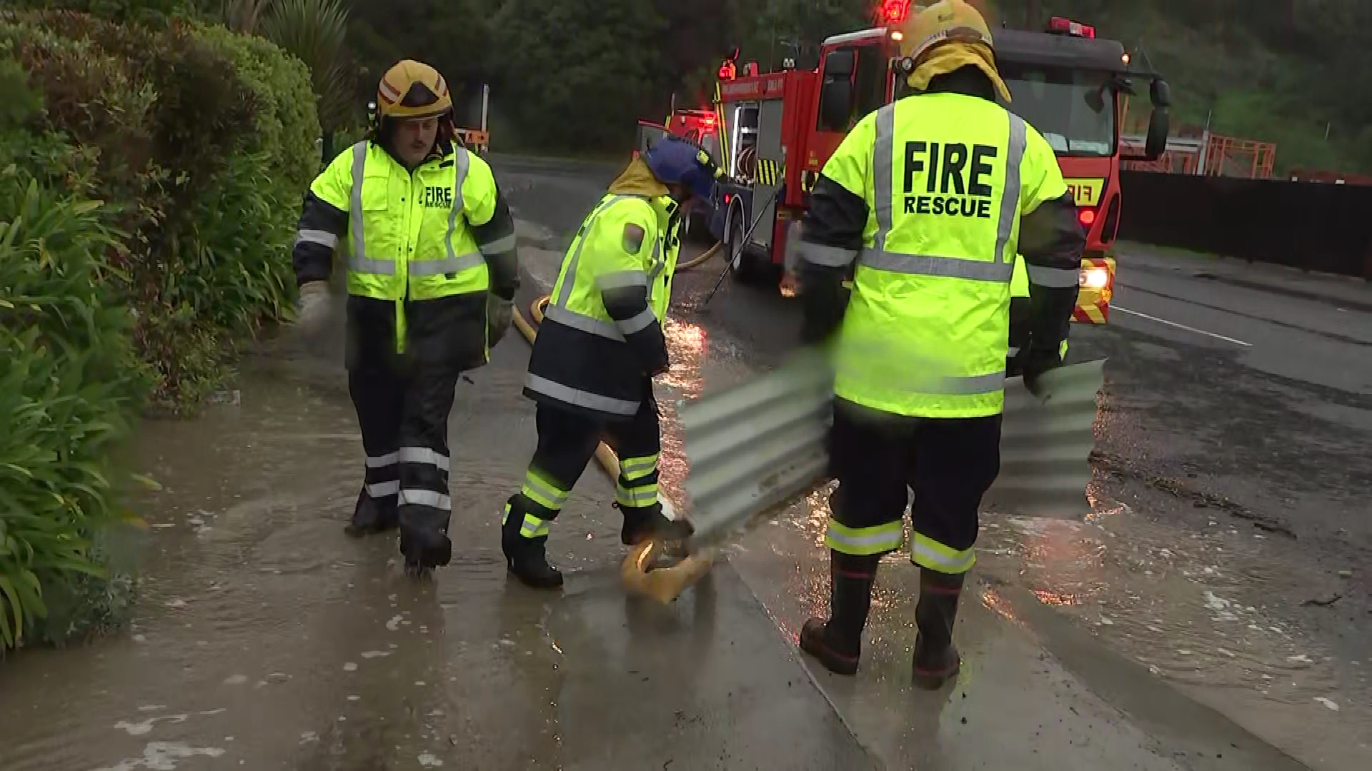 Emergency services assist at the scene of flooding in Kaikōura.
