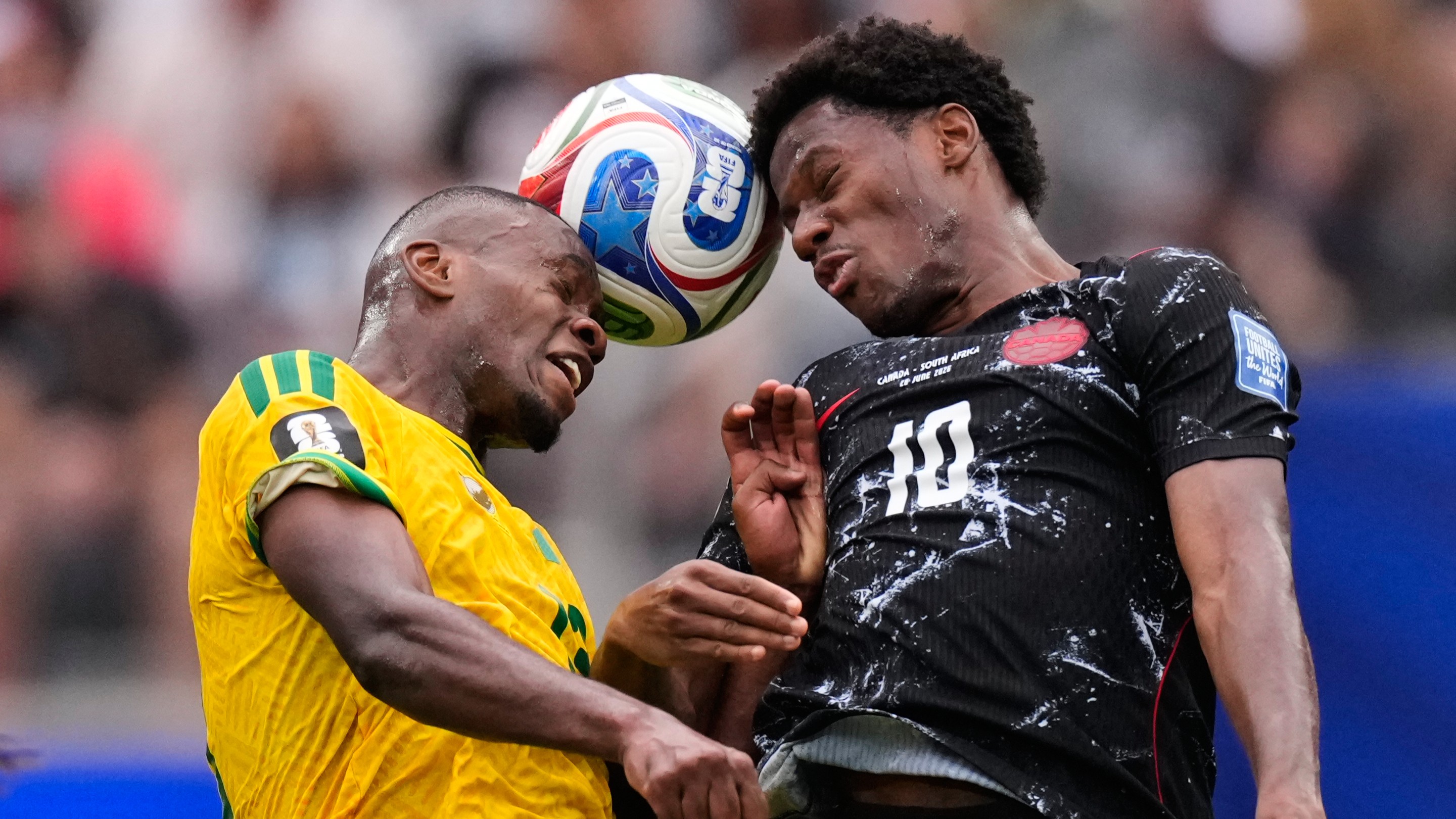 South Africa's Sphephelo Sithole and Canada's Jonathan David (10) go for a header during a World Cup round of 32 soccer match in Inglewood, Calif., near Los Angeles, Sunday, June 28, 2026.