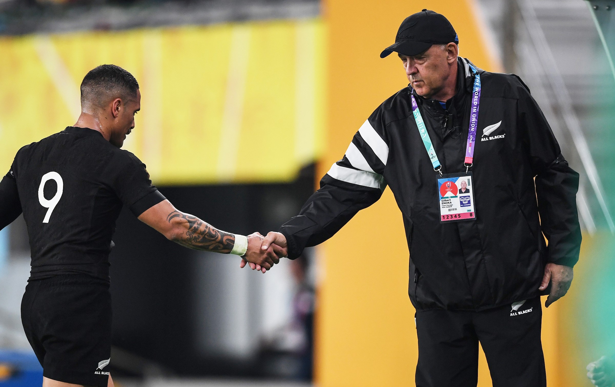 Gilbert Enoka shakes hands with Aaron Smith during the All Blacks' World Cup quarter-final win over Ireland in 2019.