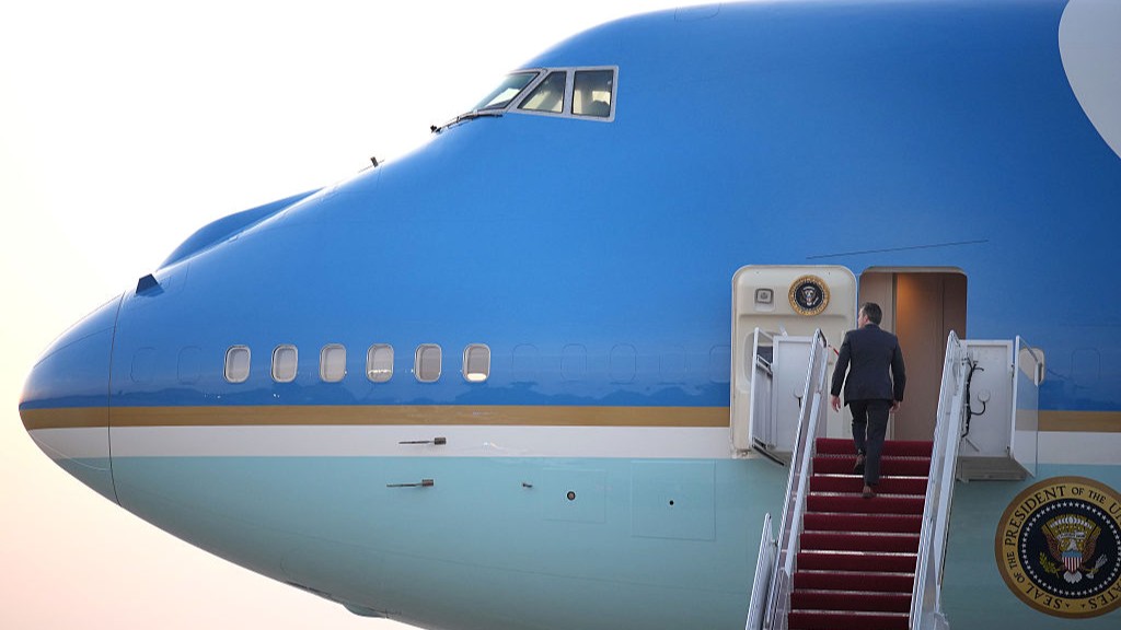 US Secretary of Defence Pete Hegseth boards Air Force One ahead of President Donald Trump as they depart for the 2025 NATO Summit.