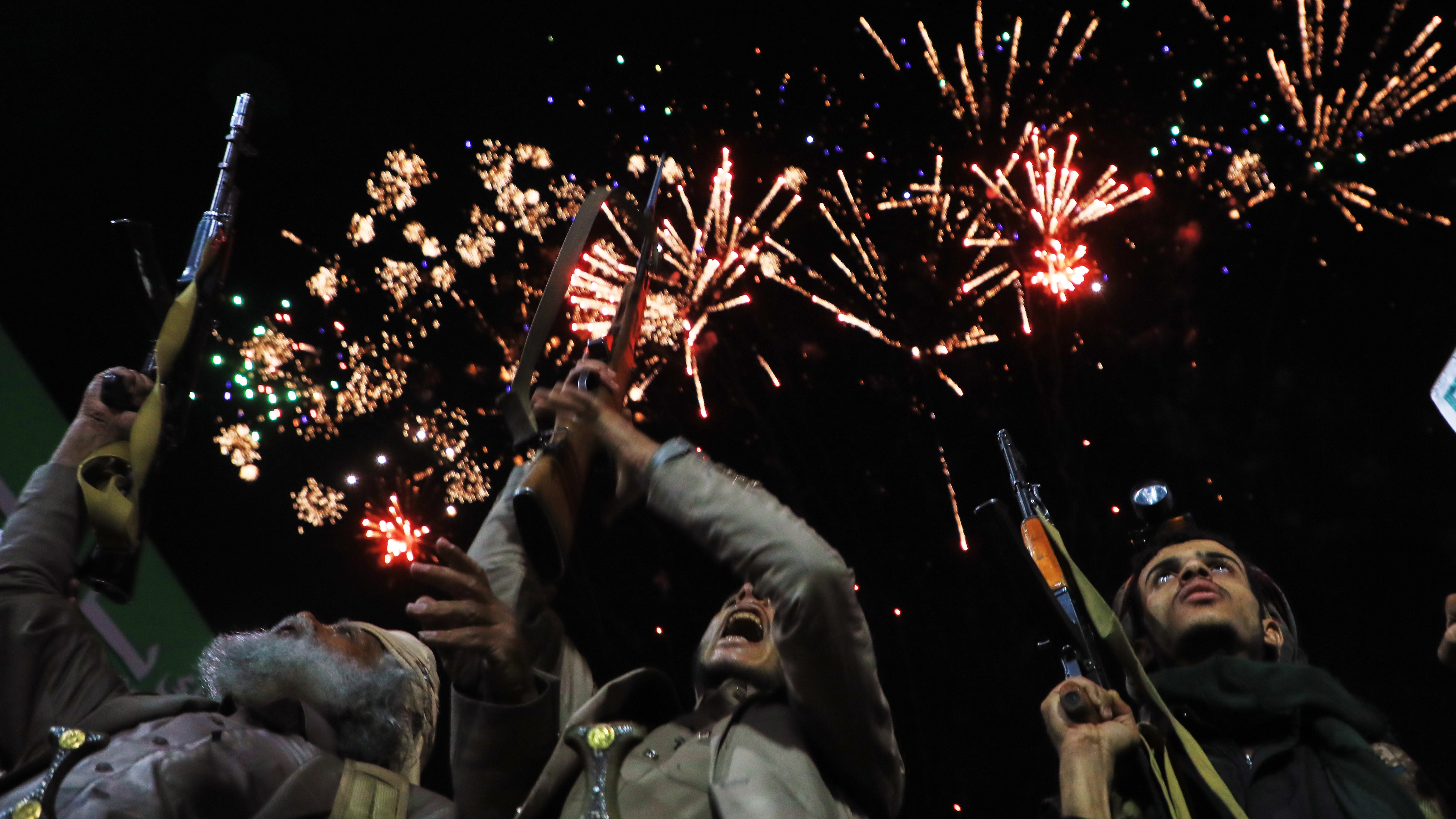 Fireworks burst as Houthi supporters rally against the Saudi-led coalition in Sanaa, Yemen, Monday, July 20, 2026.