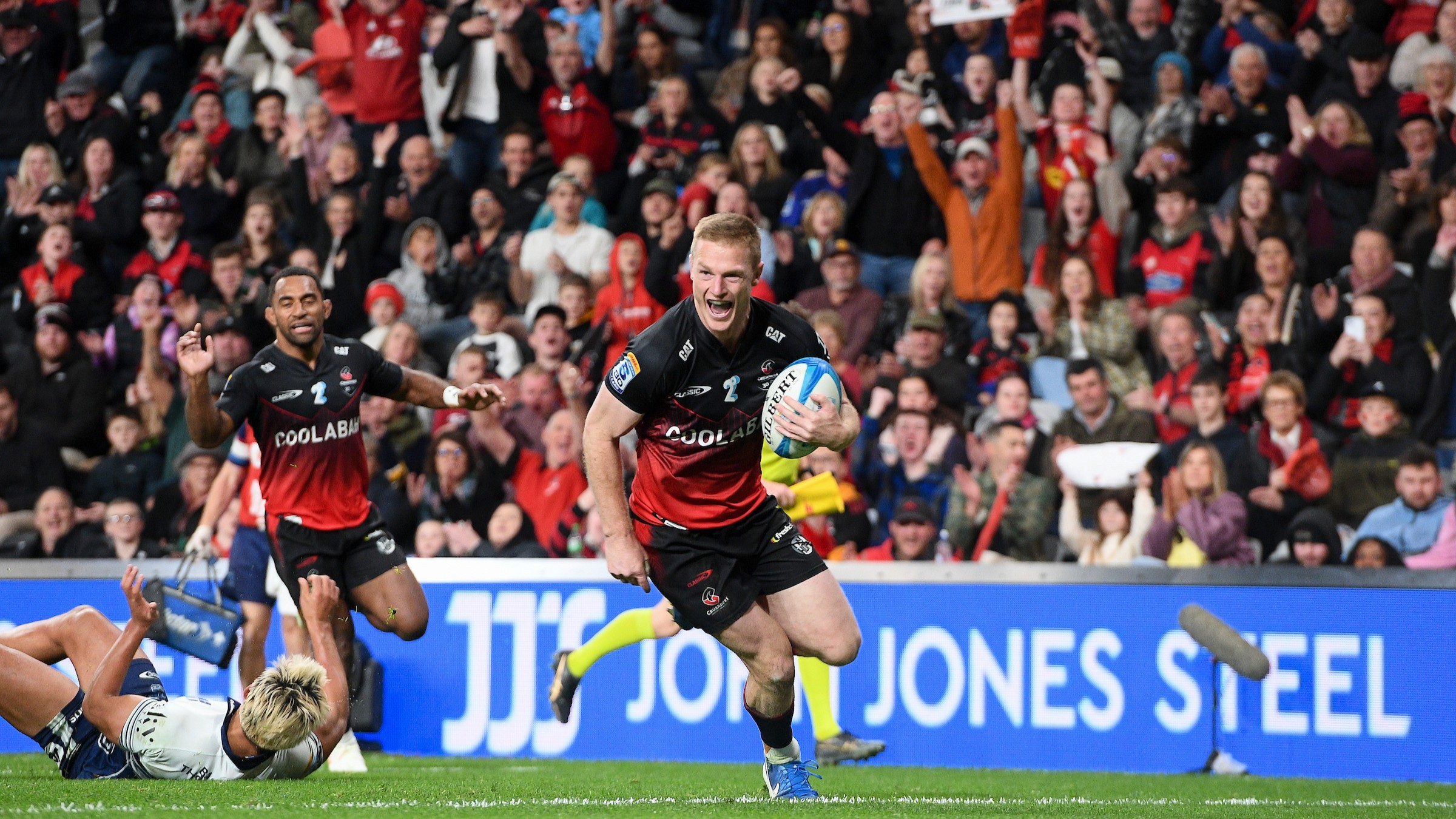 Johnny McNicholl of the Crusaders scores a try during the Super Rugby Pacific semifinal at One NZ Stadium.